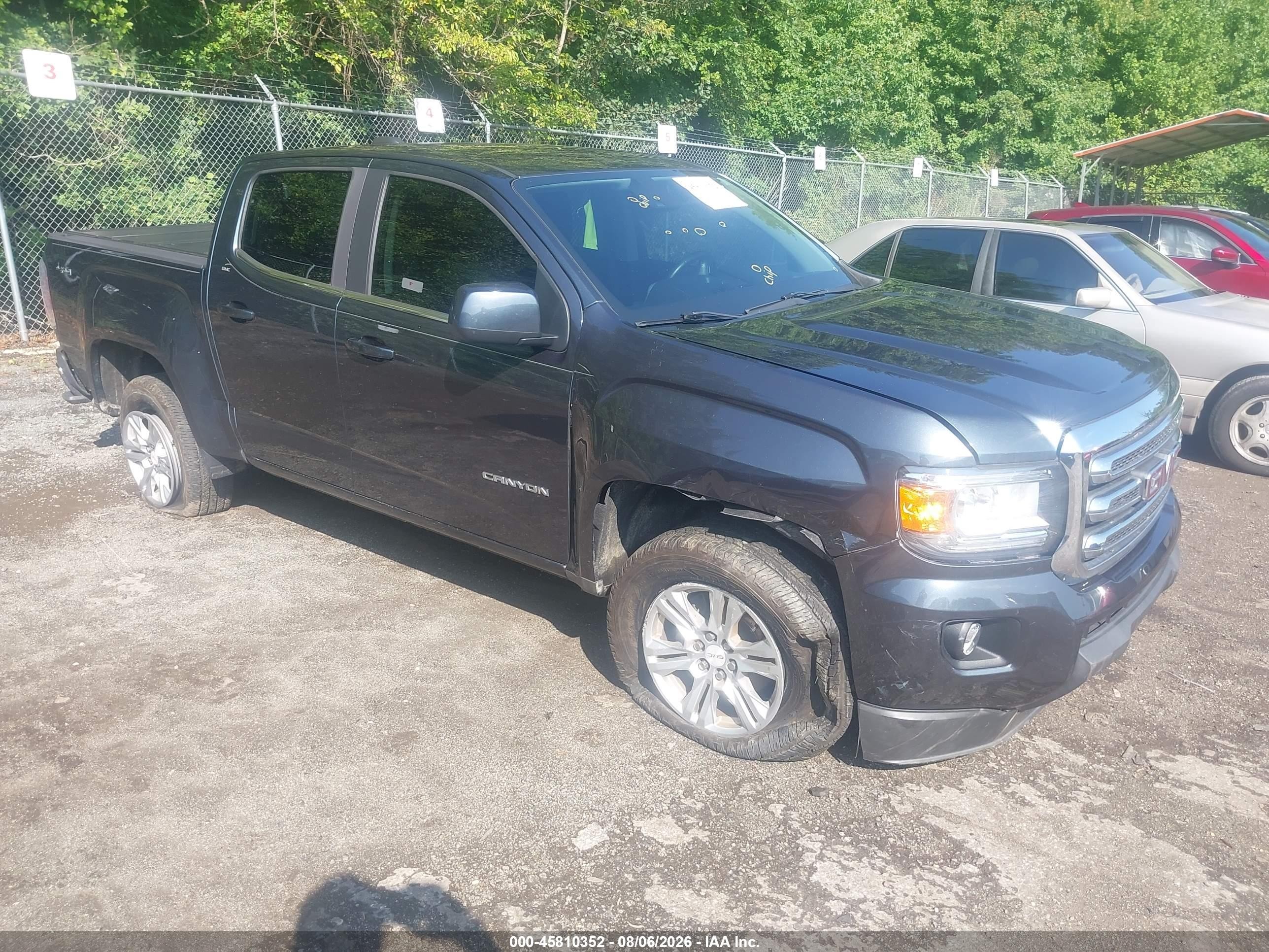 2019 GMC Canyon VIN 1GTG6CEN2K1271562 — IAAI salvage auction photo