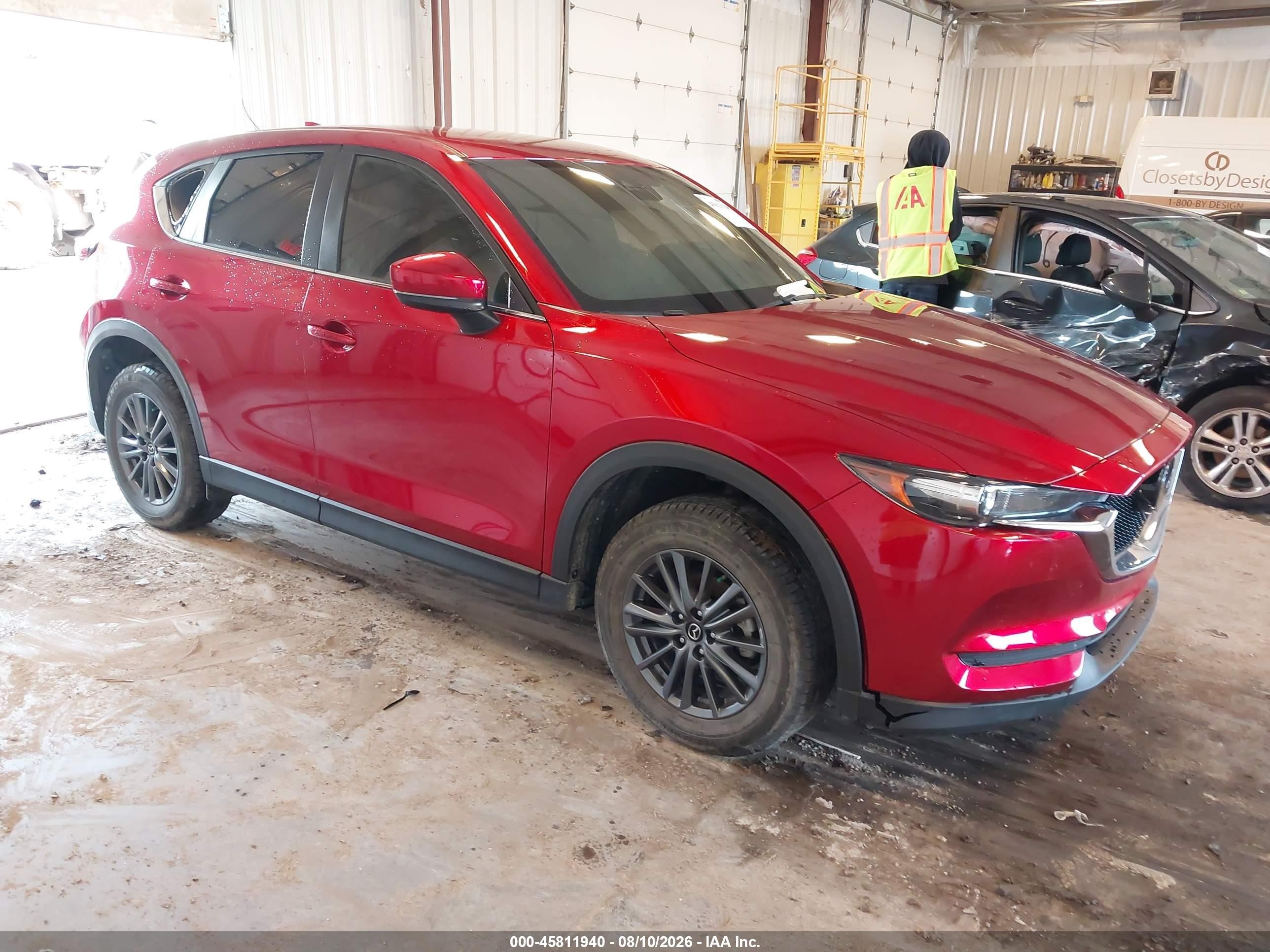 2021 Mazda CX-5 VIN JM3KFBCM3M0486043 — IAAI salvage auction photo