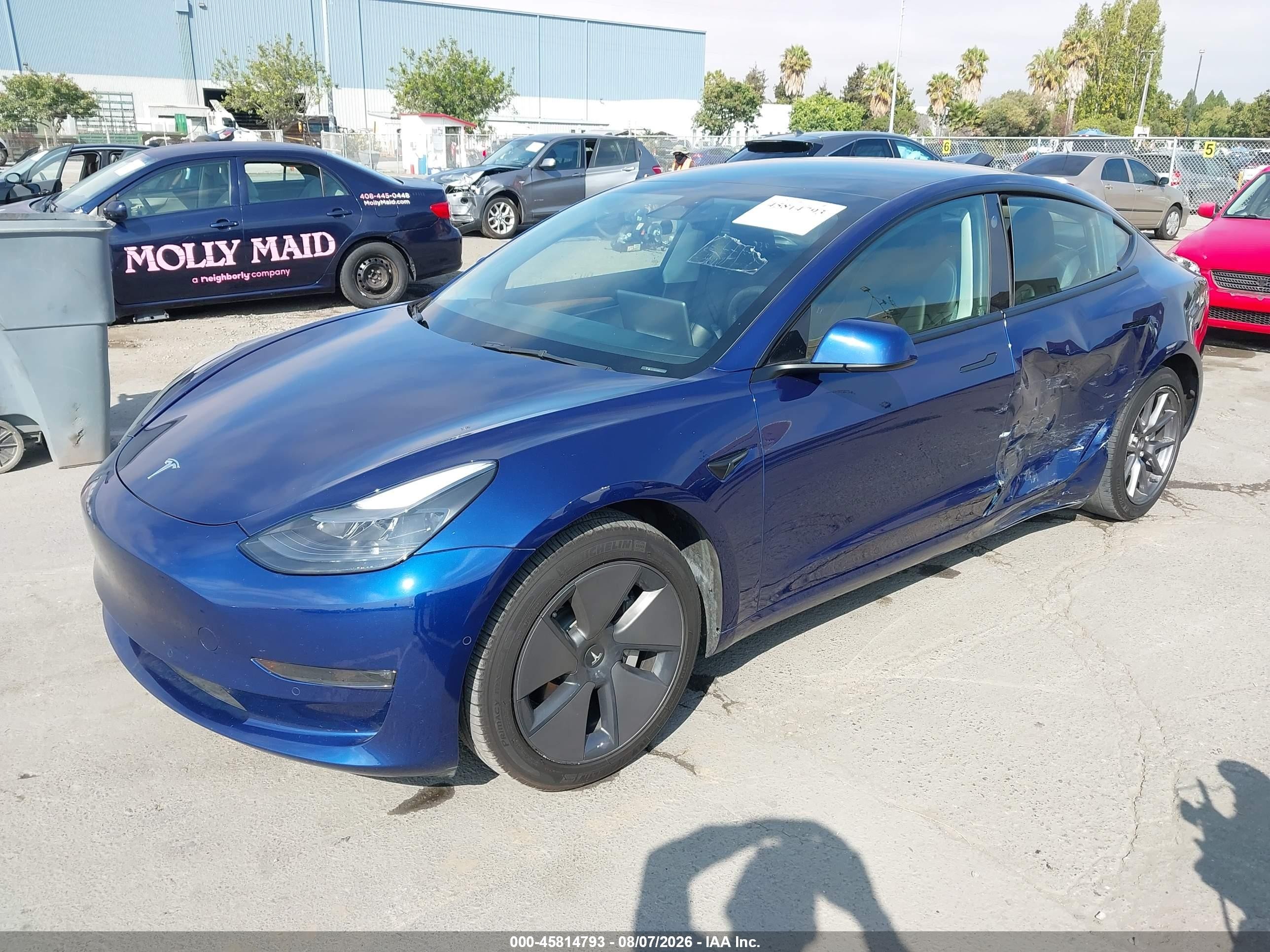 2022 Tesla Model 3 VIN 5YJ3E1EB8NF317533 IAAI salvage auction — Side, Salvage (California), sold $10,250 on 2026-10-09 (photo 2)