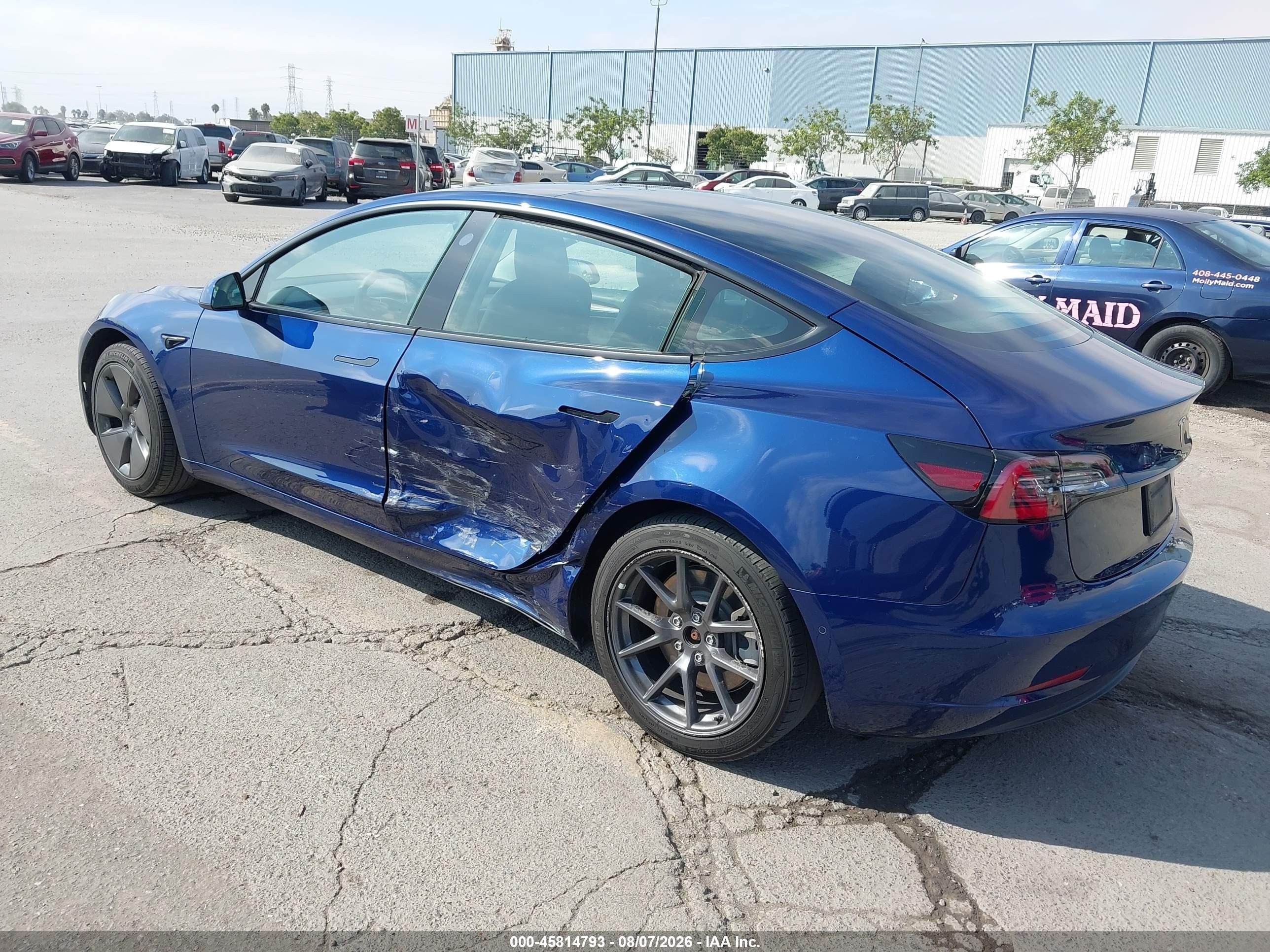2022 Tesla Model 3 VIN 5YJ3E1EB8NF317533 IAAI salvage auction — Side, Salvage (California), sold $10,250 on 2026-10-09 (photo 3)