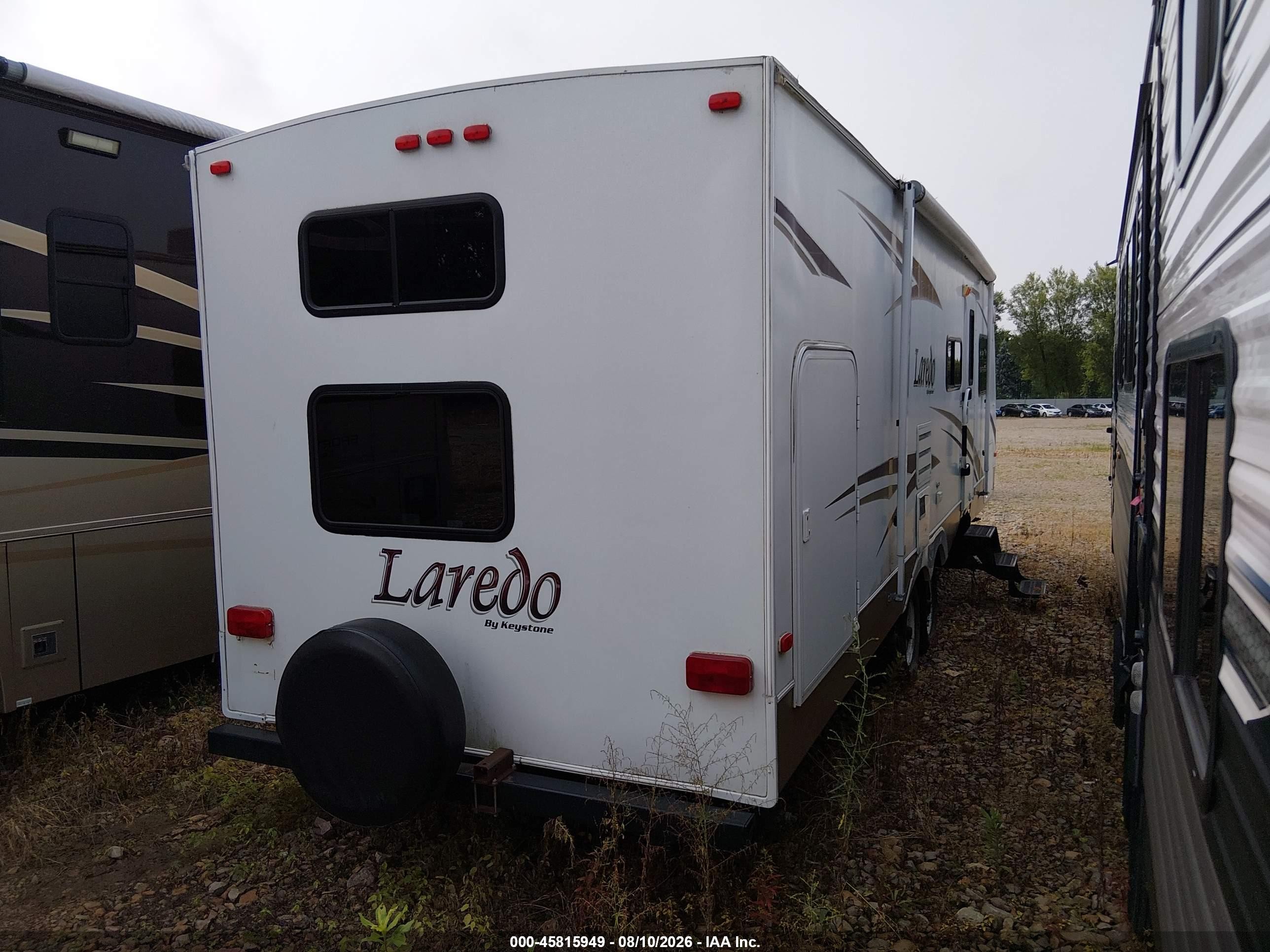 2007 Keystone Laredo VIN 4YDT284297L602385 IAAI salvage auction — Water/Flood, Junk Bill Of Sale Mv2459 (Wisconsin), sold $100 on 2026-10-03 (photo 4)