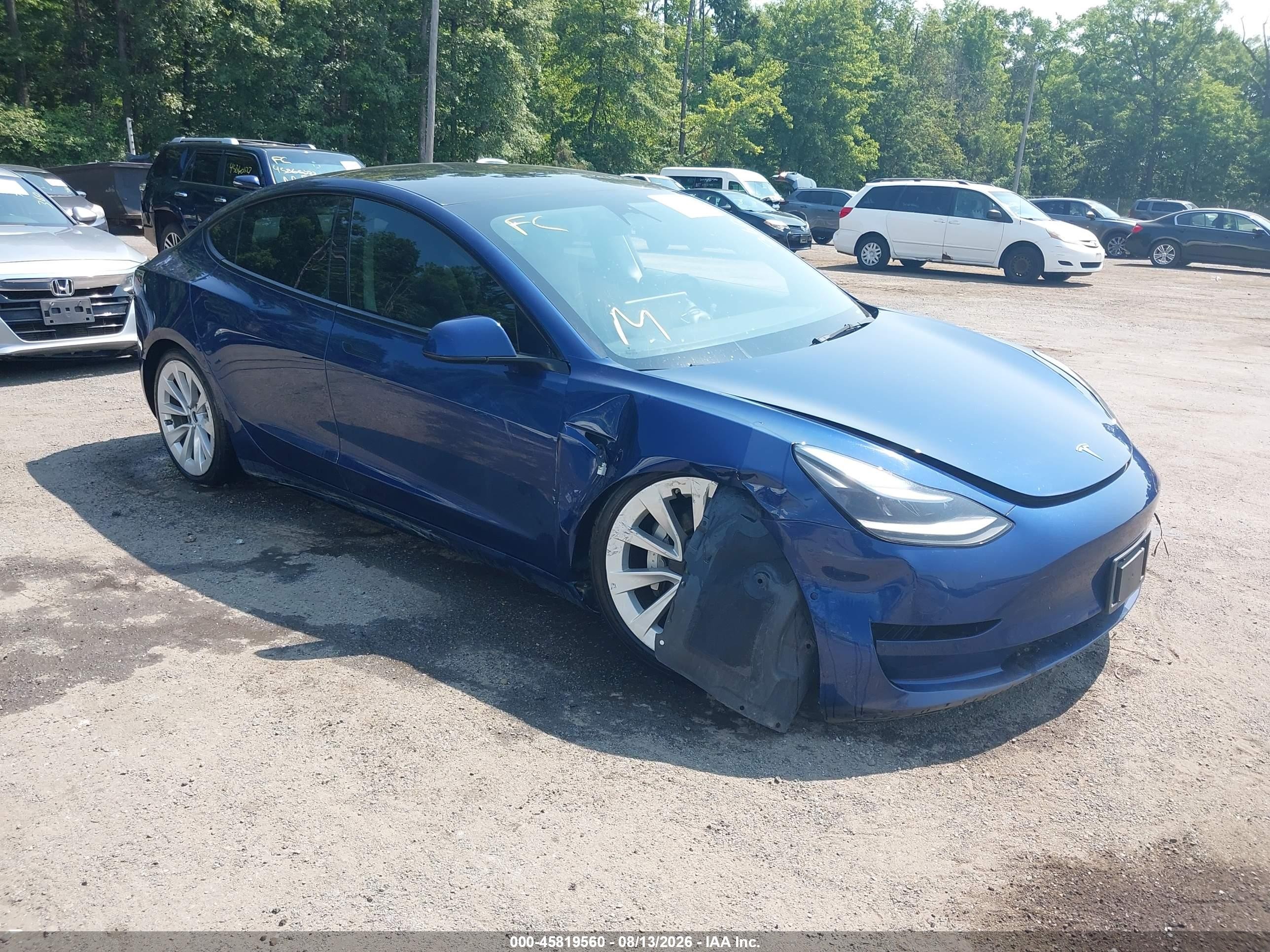 2022 Tesla Model 3 VIN 5YJ3E1EA9NF369194 — IAAI salvage auction photo