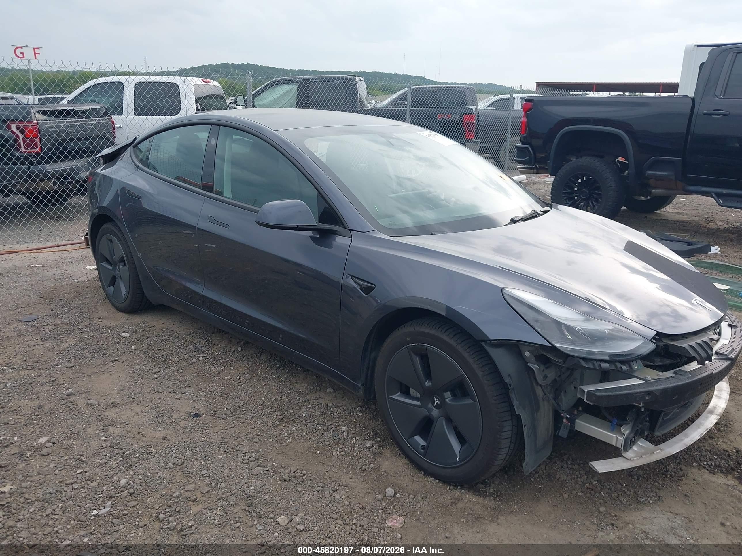 2023 Tesla Model 3 VIN 5YJ3E1EB2PF389170 — IAAI salvage auction photo