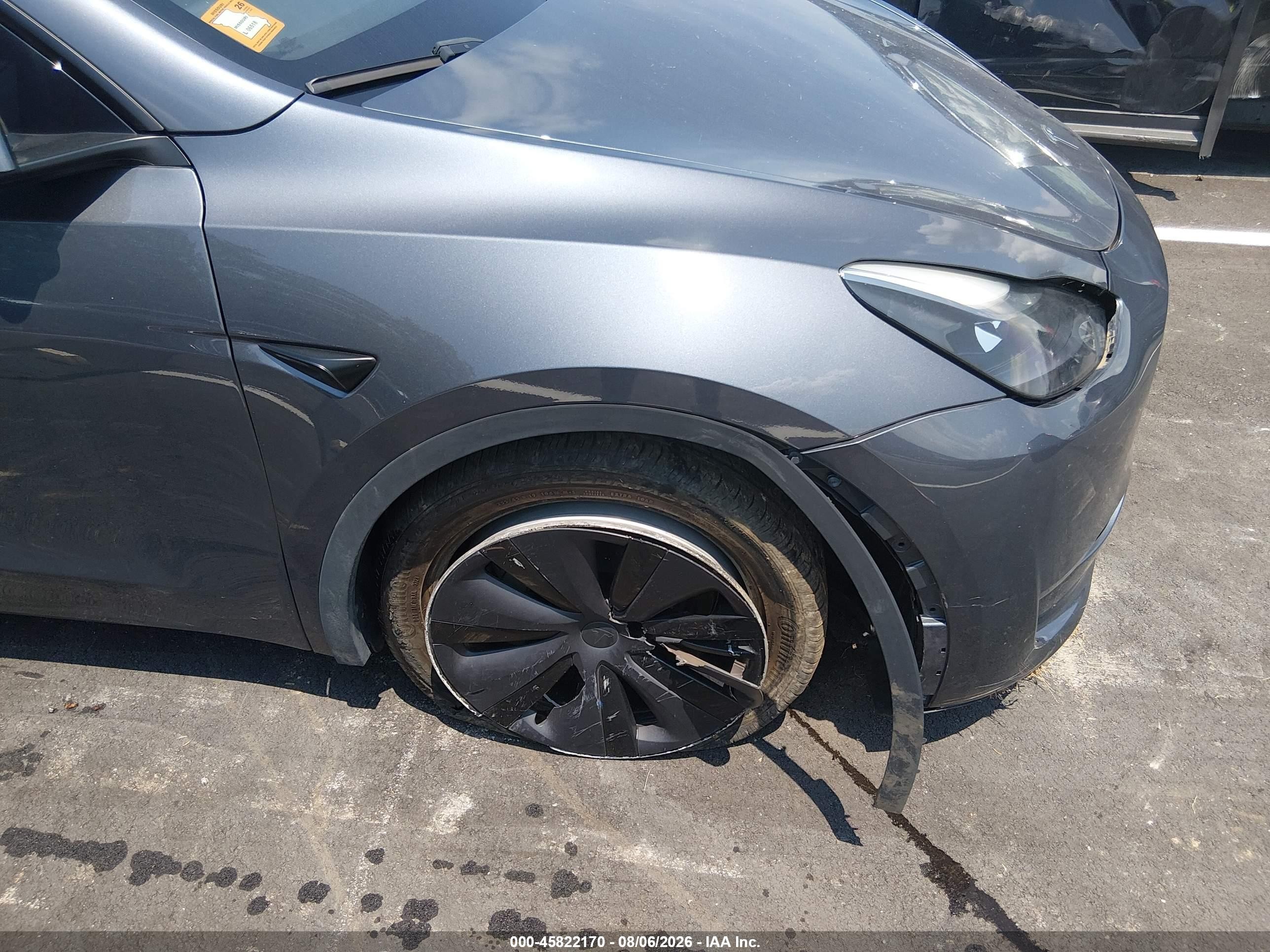 2023 Tesla Model Y VIN 7SAYGDED7PF948122 IAAI salvage auction — Side, Salvage (Tennessee), sold $8,600 on 2026-09-12 (photo 6)