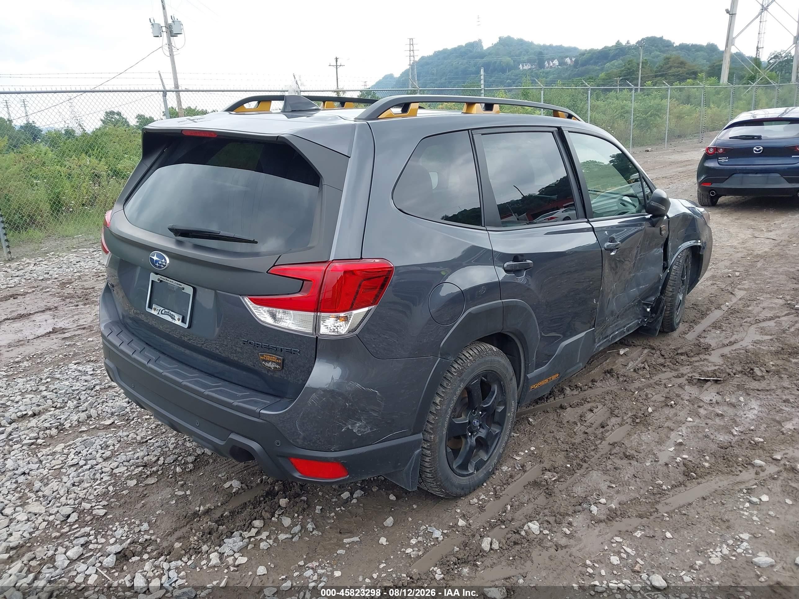 2024 Subaru Forester VIN JF2SKAJC8RH529987 IAAI salvage auction — Side, Salvage (Pennsylvania), sold $9,300 on 2026-09-12 (photo 4)