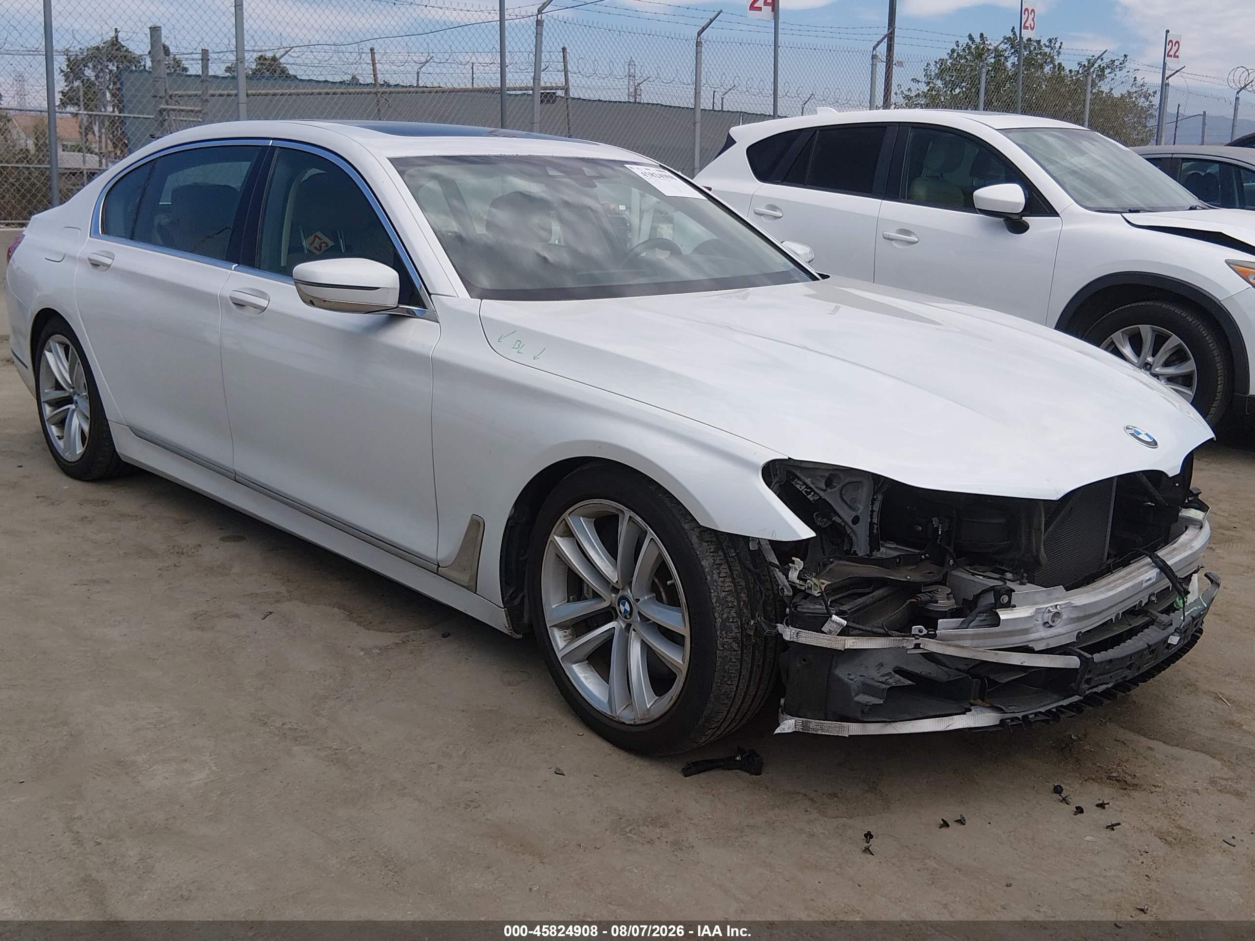 2016 BMW 7 Series VIN WBA7F2C59GG418135 — IAAI salvage auction photo