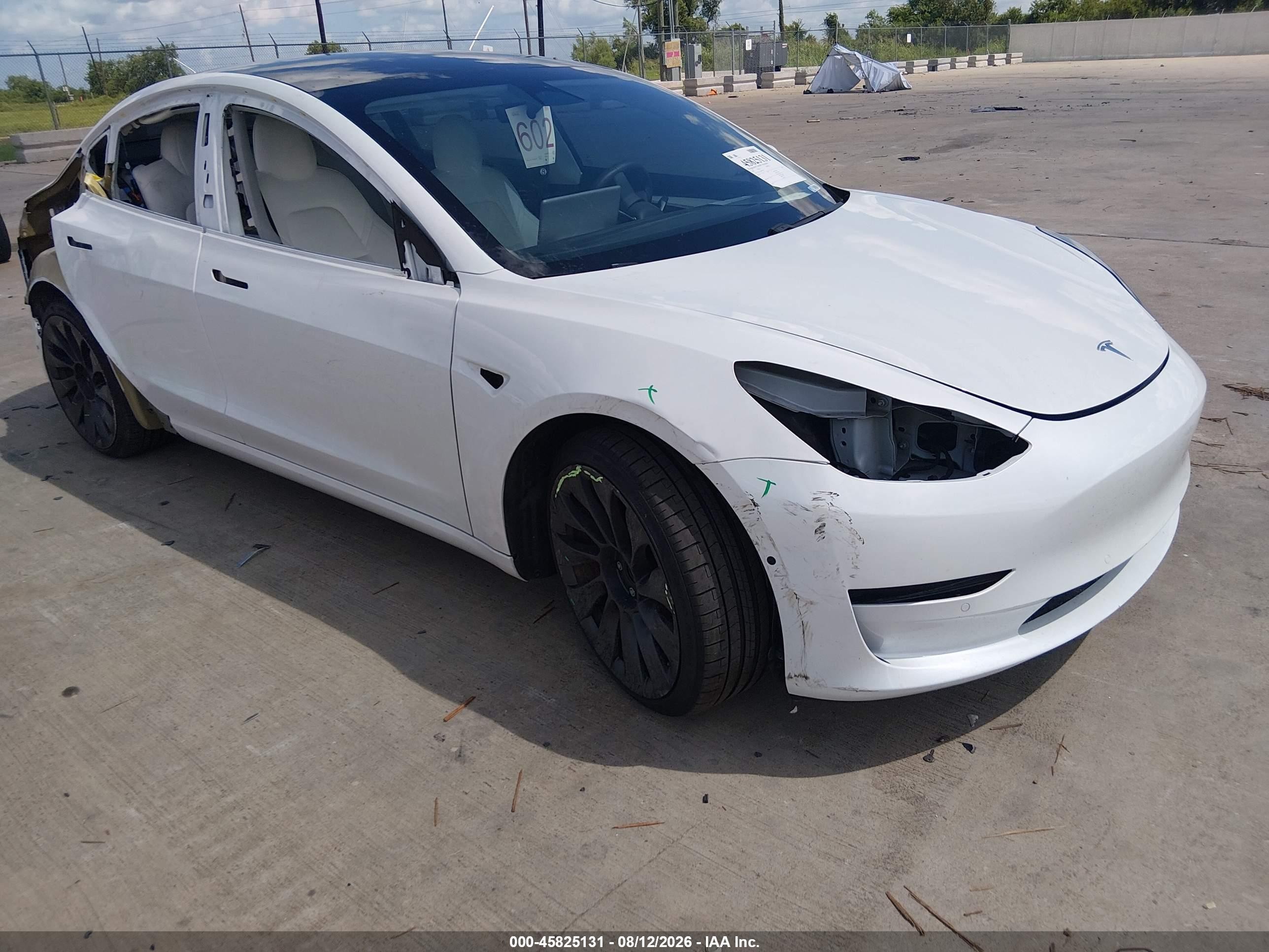 2021 Tesla Model 3 VIN 5YJ3E1EC1MF991305 — IAAI salvage auction photo