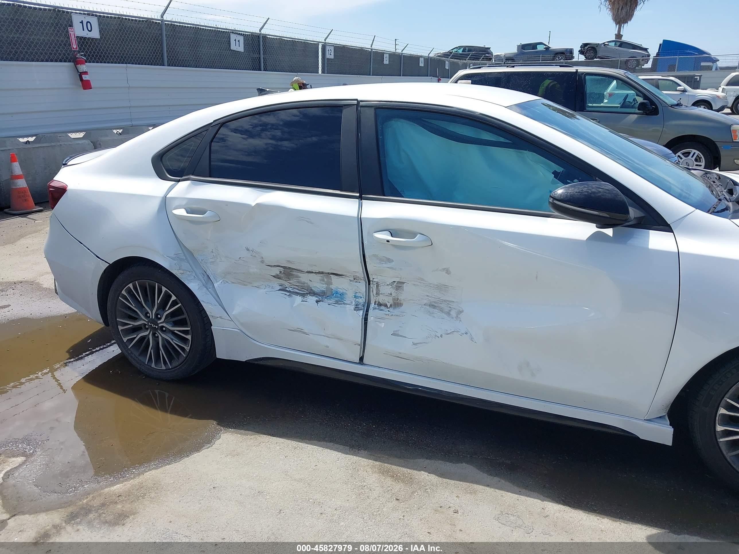 2023 Kia Forte VIN 3KPF54AD6PE615402 IAAI salvage auction — Side, Salvage (California), sold $4,050 on 2026-09-04 (photo 6)