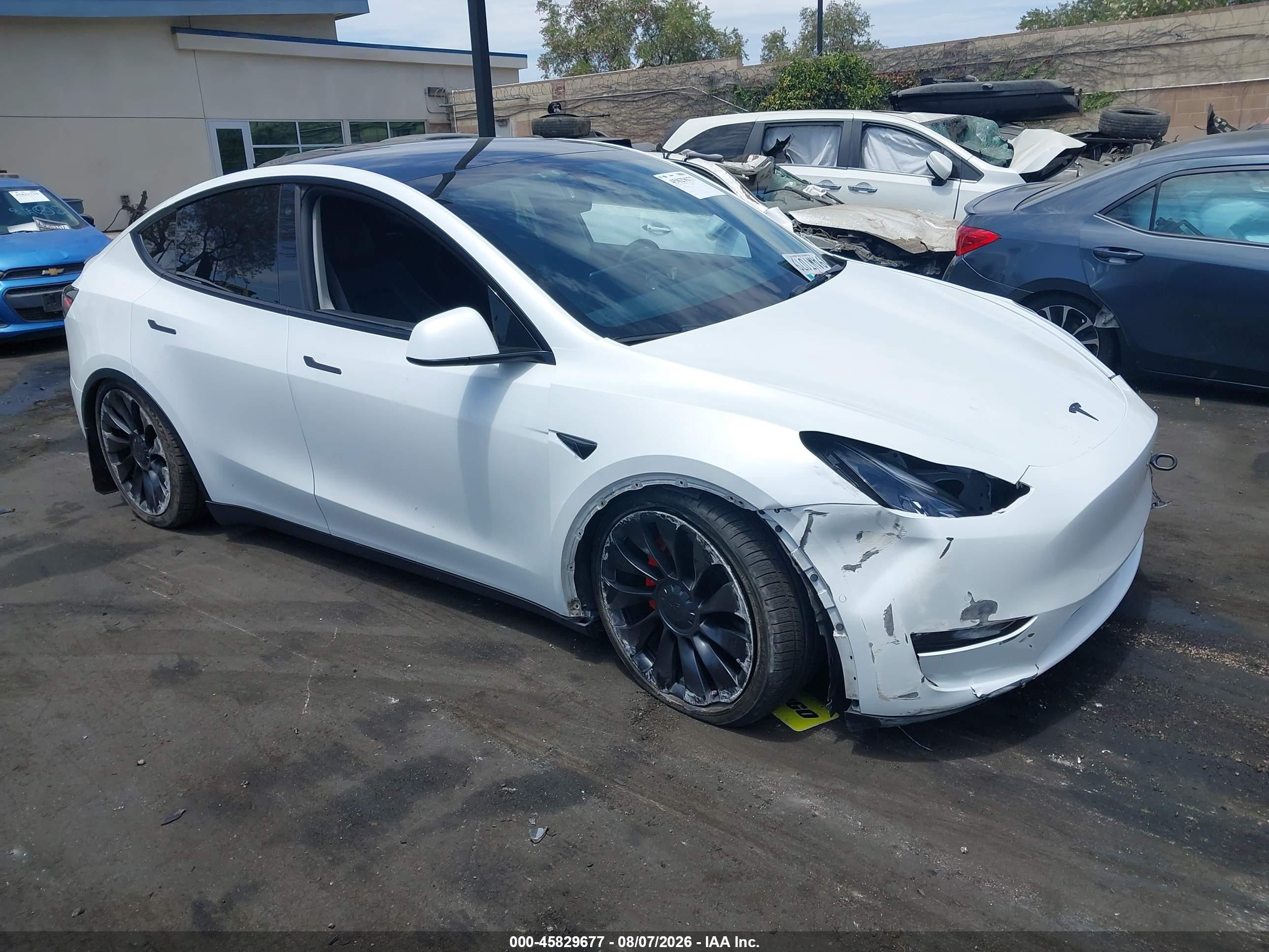 2022 Tesla Model Y VIN 7SAYGDEF6NF404628 — IAAI salvage auction photo