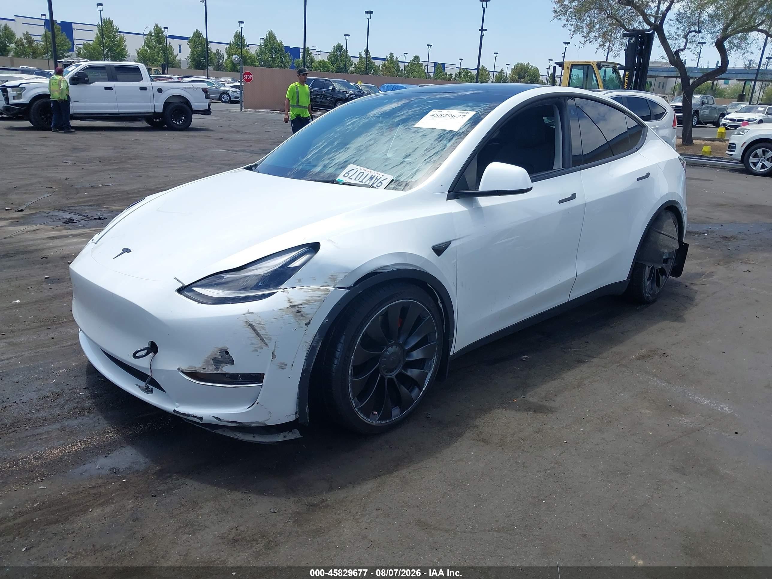 2022 Tesla Model Y VIN 7SAYGDEF6NF404628 IAAI salvage auction — Side, Salvage Certificate (California), sold $9,400 on 2026-09-13 (photo 2)