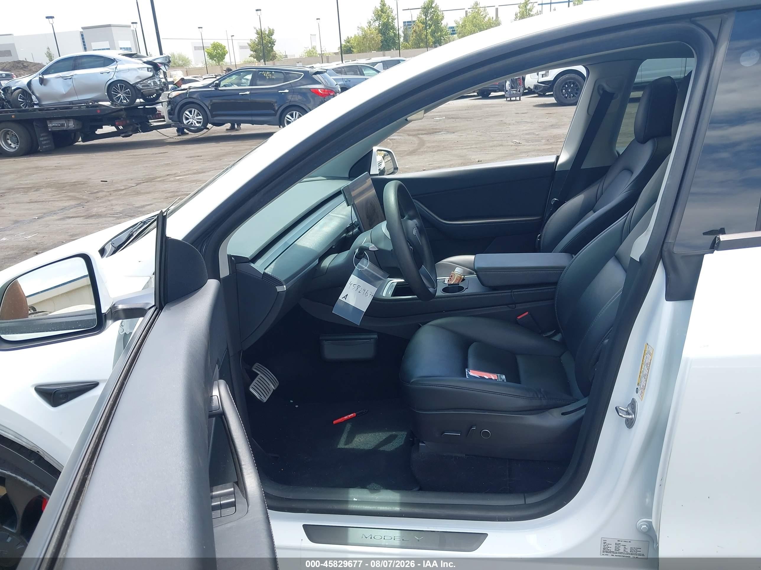 2022 Tesla Model Y VIN 7SAYGDEF6NF404628 IAAI salvage auction — Side, Salvage Certificate (California), sold $9,400 on 2026-09-13 (photo 5)