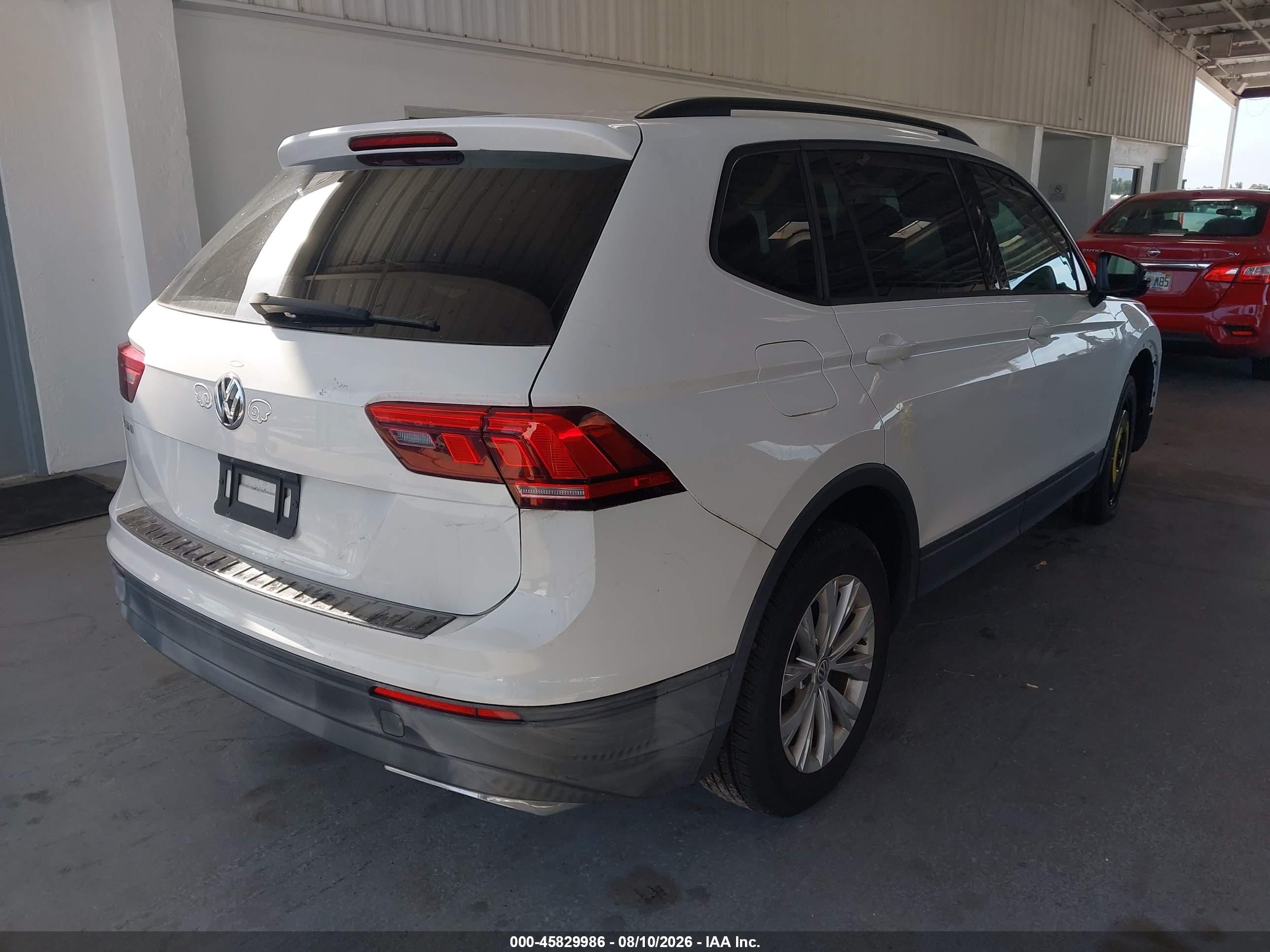 2019 Volkswagen Tiguan VIN 3VV1B7AX1KM080977 IAAI salvage auction — Unknown, Rebuildable (Florida), sold $3,500 on 2026-09-05 (photo 4)
