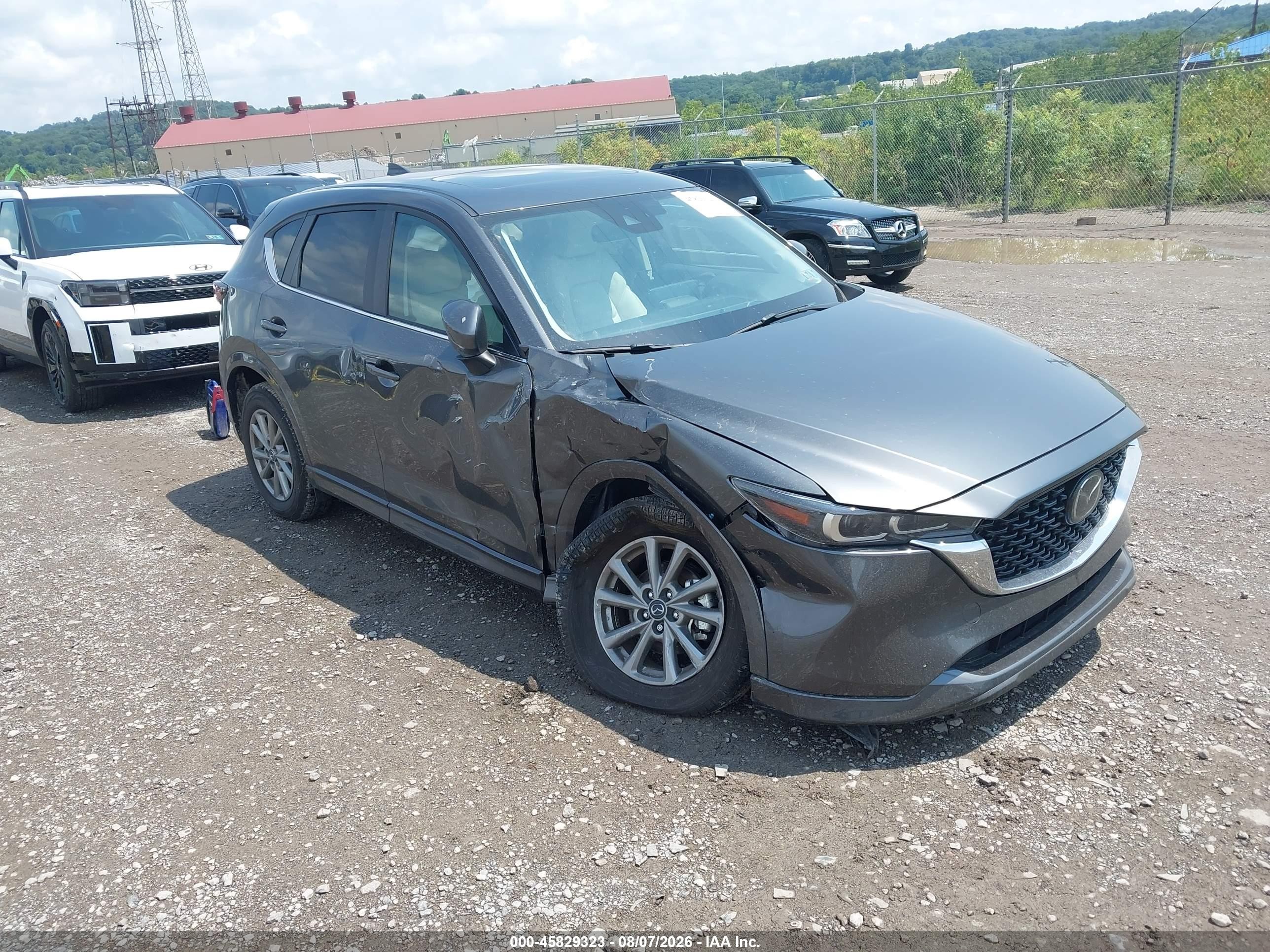 2025 Mazda CX-5 VIN JM3KFBCM3S0797999 — IAAI salvage auction photo