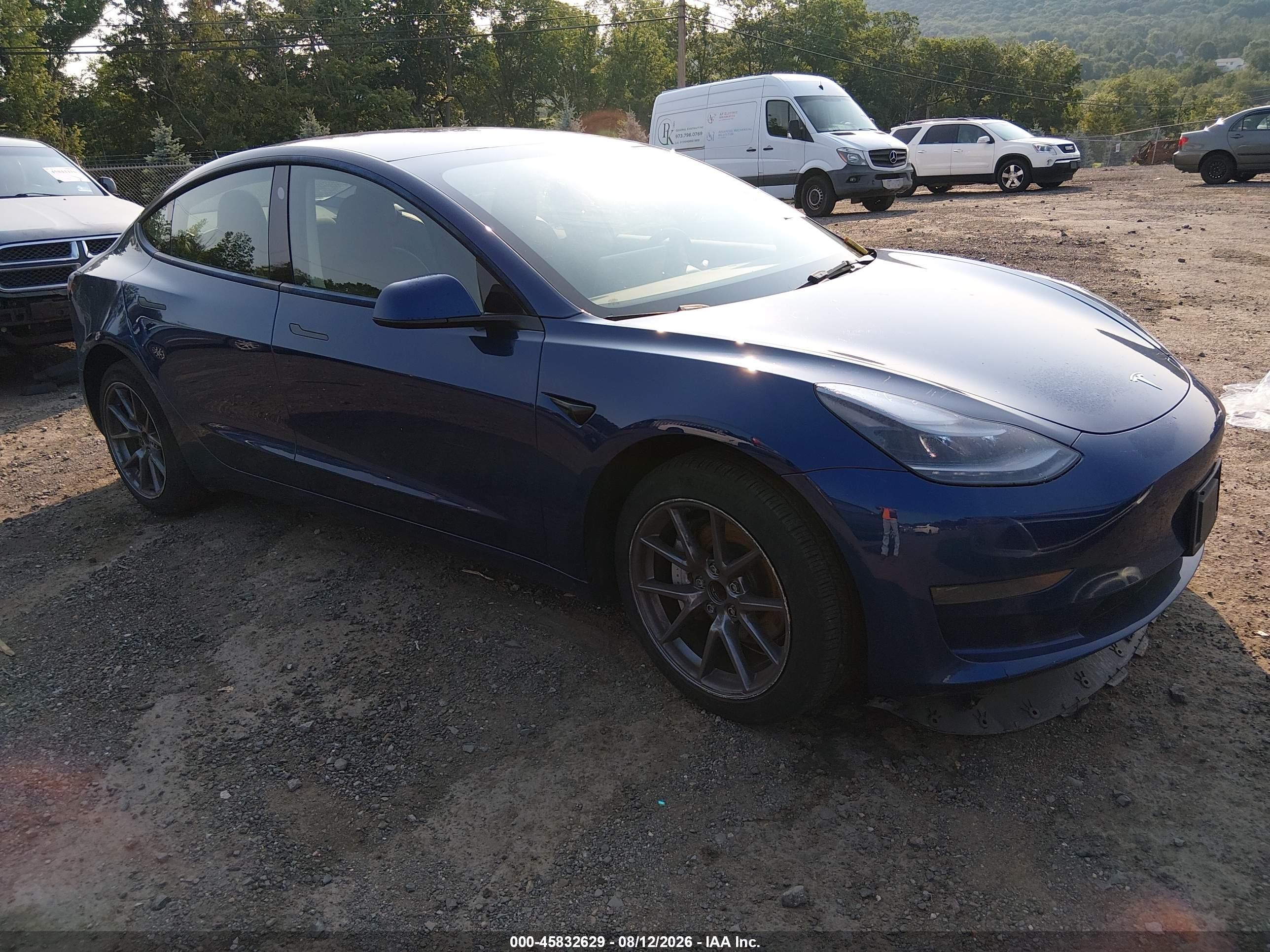 2023 Tesla Model 3 VIN 5YJ3E1EA7PF578341 — IAAI salvage auction photo