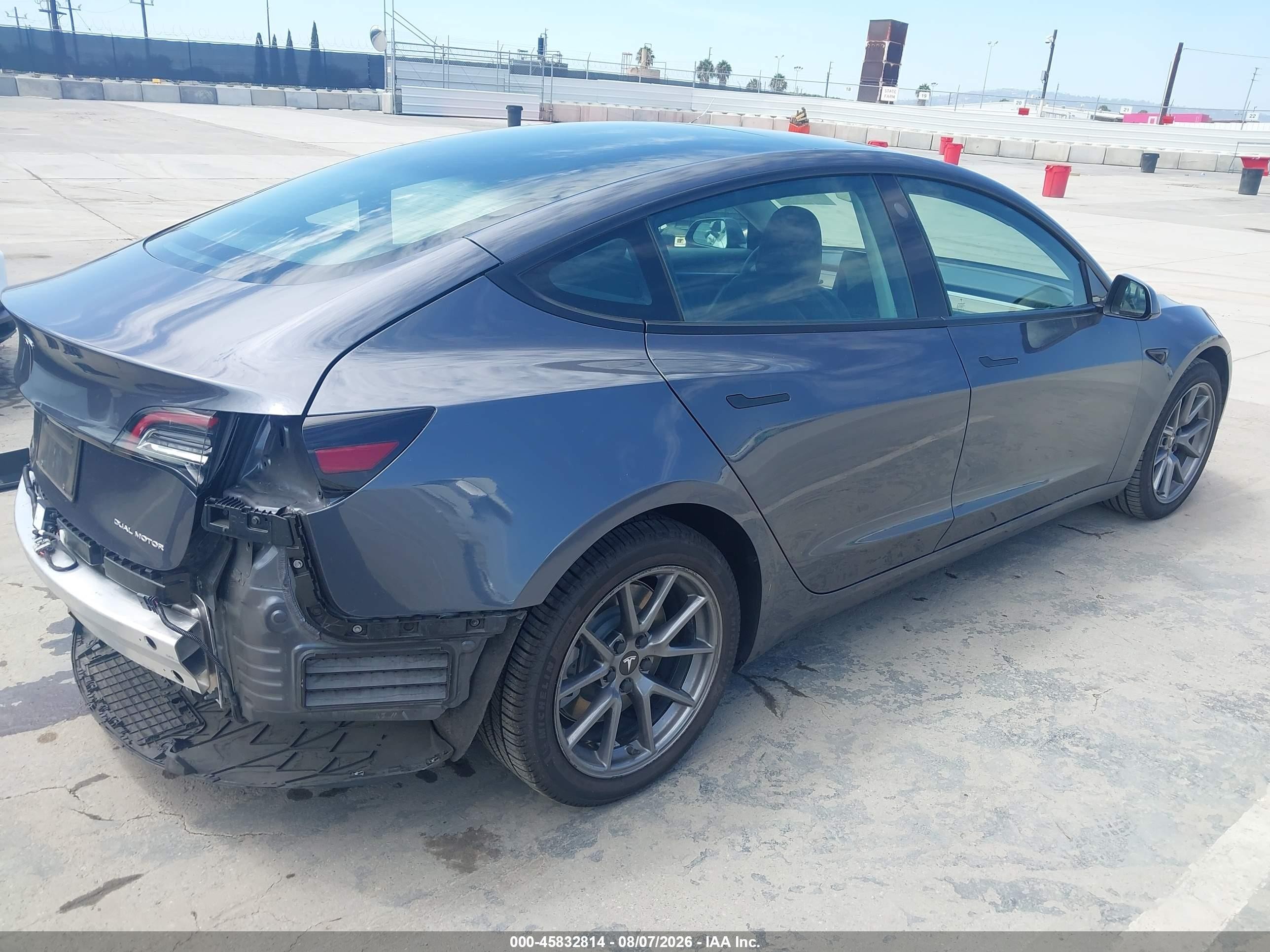 2022 Tesla Model 3 VIN 5YJ3E1EB3NF277815 IAAI salvage auction — Rear End, Salvage (California), sold $11,200 on 2026-09-13 (photo 4)
