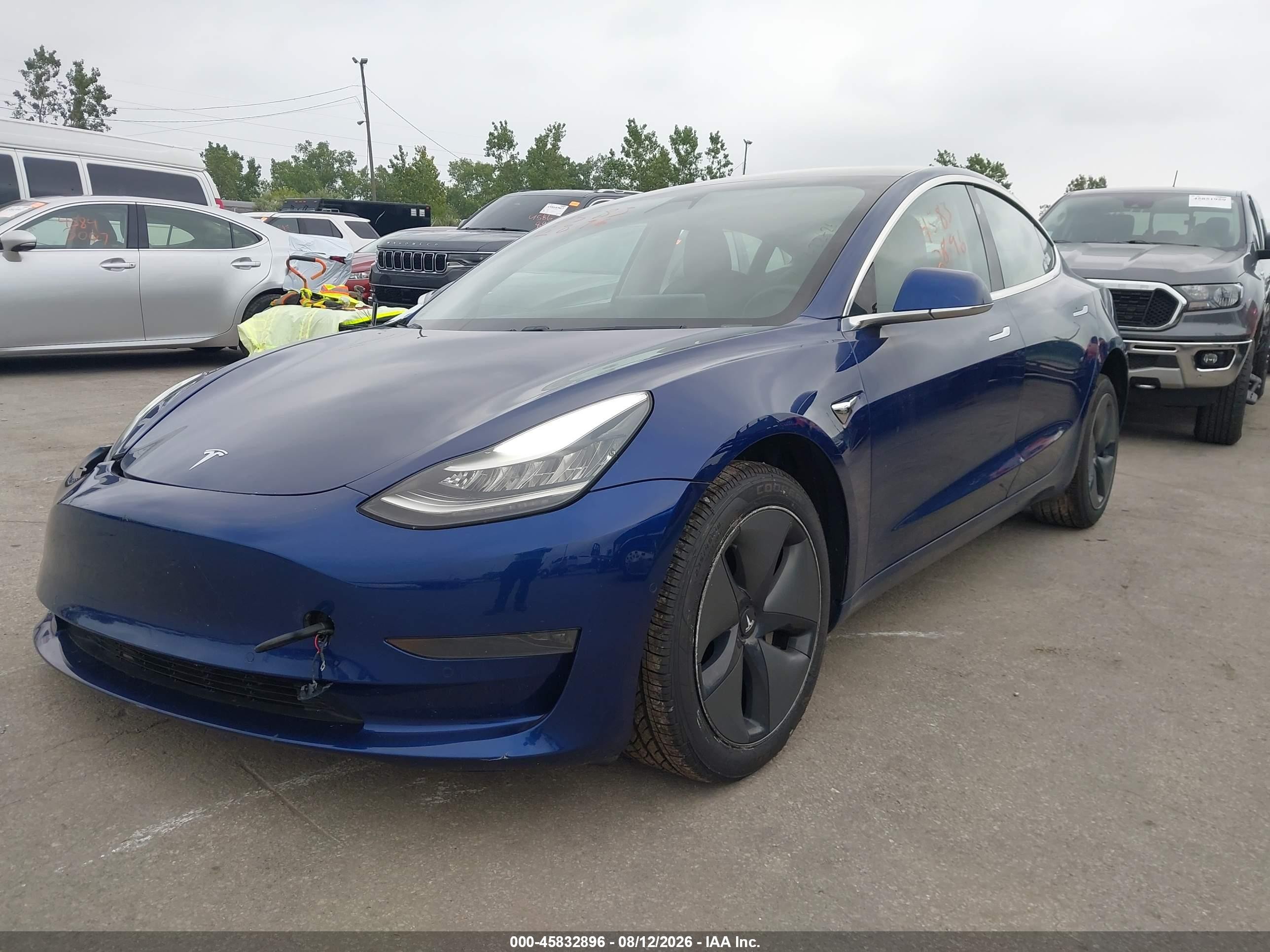 2020 Tesla Model 3 VIN 5YJ3E1EAXLF736892 IAAI salvage auction — Unknown, Salvage (Ohio), sold $6,875 on 2026-10-02 (photo 2)