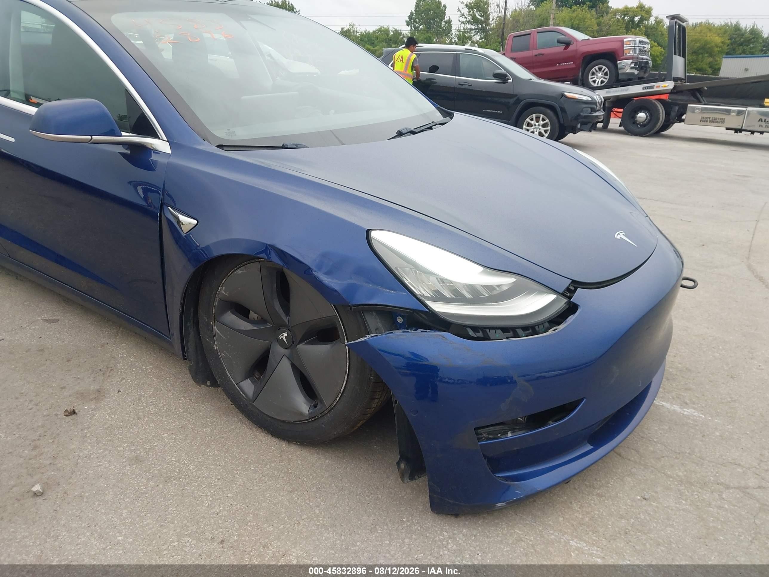 2020 Tesla Model 3 VIN 5YJ3E1EAXLF736892 IAAI salvage auction — Unknown, Salvage (Ohio), sold $6,875 on 2026-10-02 (photo 6)