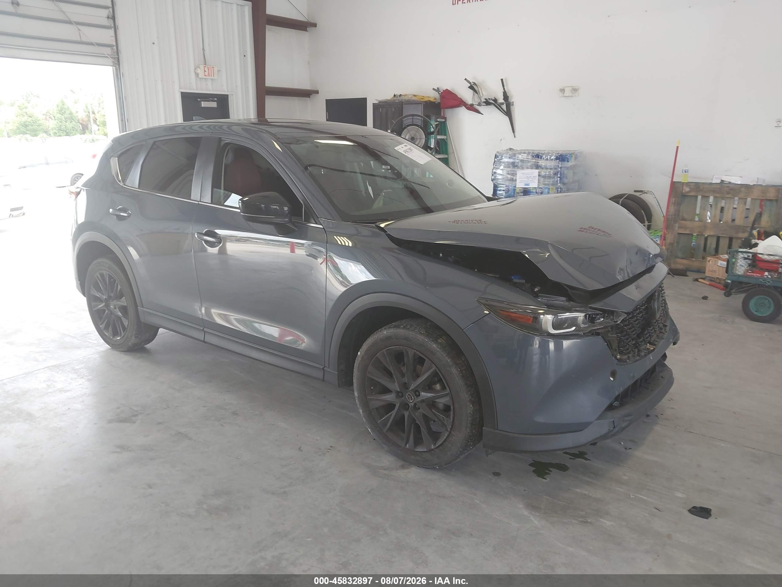 2023 Mazda CX-5 VIN JM3KFBCM9P0186513 — IAAI salvage auction photo