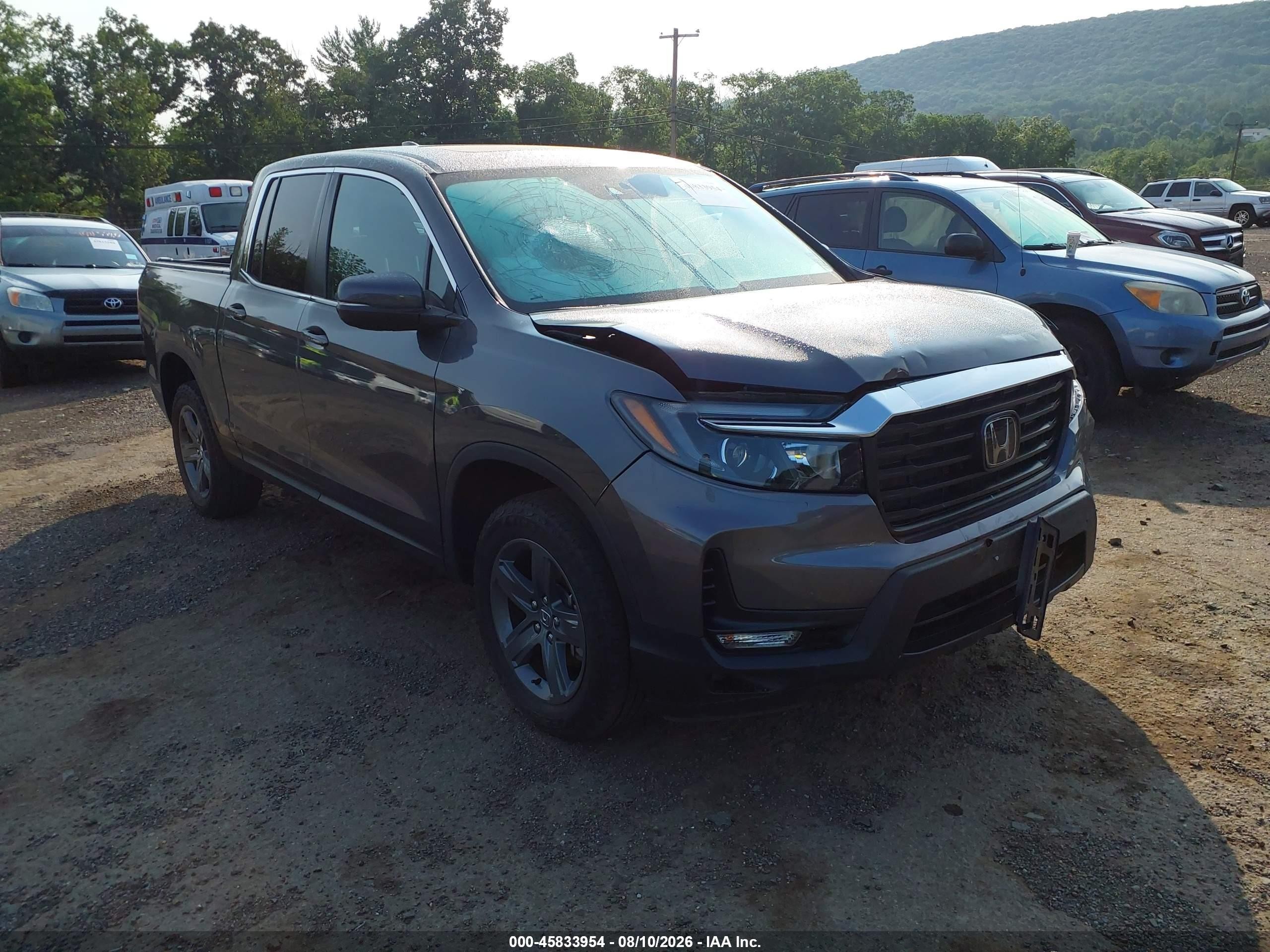 2023 Honda Ridgeline VIN 5FPYK3F59PB016623 — IAAI salvage auction photo