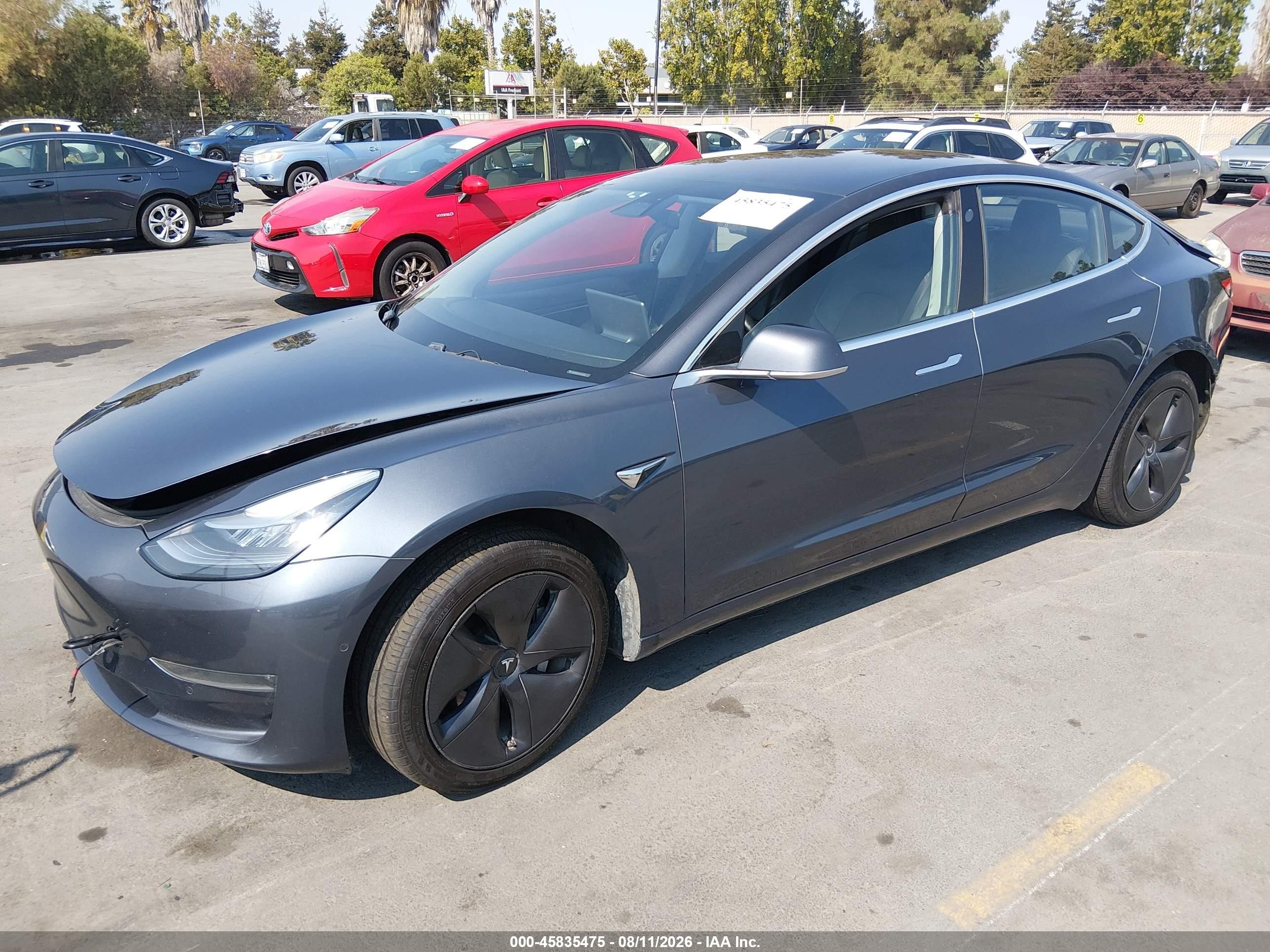 2018 Tesla Model 3 VIN 5YJ3E1EA8JF004001 IAAI salvage auction — Rear End, Salvage (California), sold $4,850 on 2026-09-14 (photo 2)