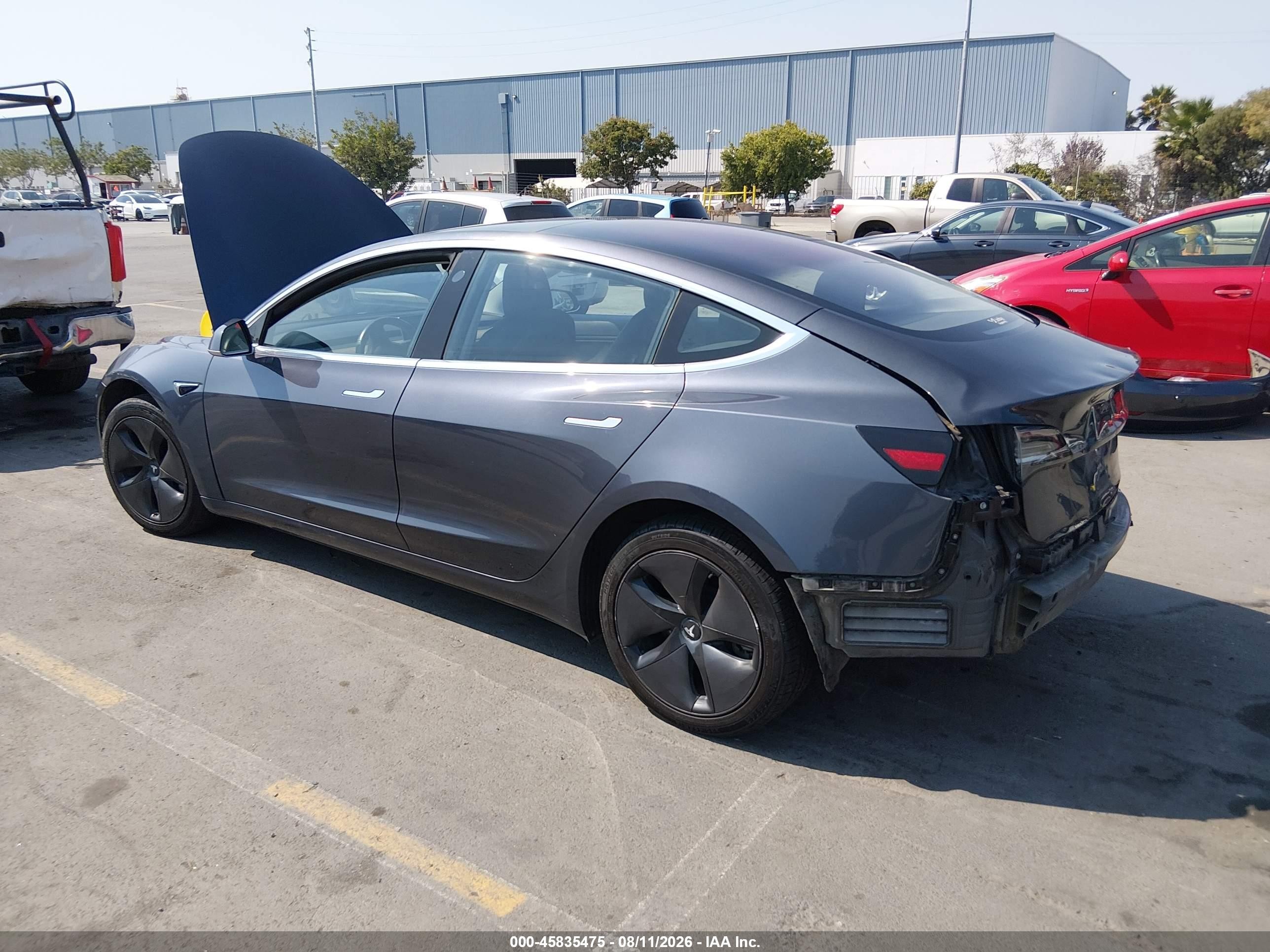 2018 Tesla Model 3 VIN 5YJ3E1EA8JF004001 IAAI salvage auction — Rear End, Salvage (California), sold $4,850 on 2026-09-14 (photo 3)