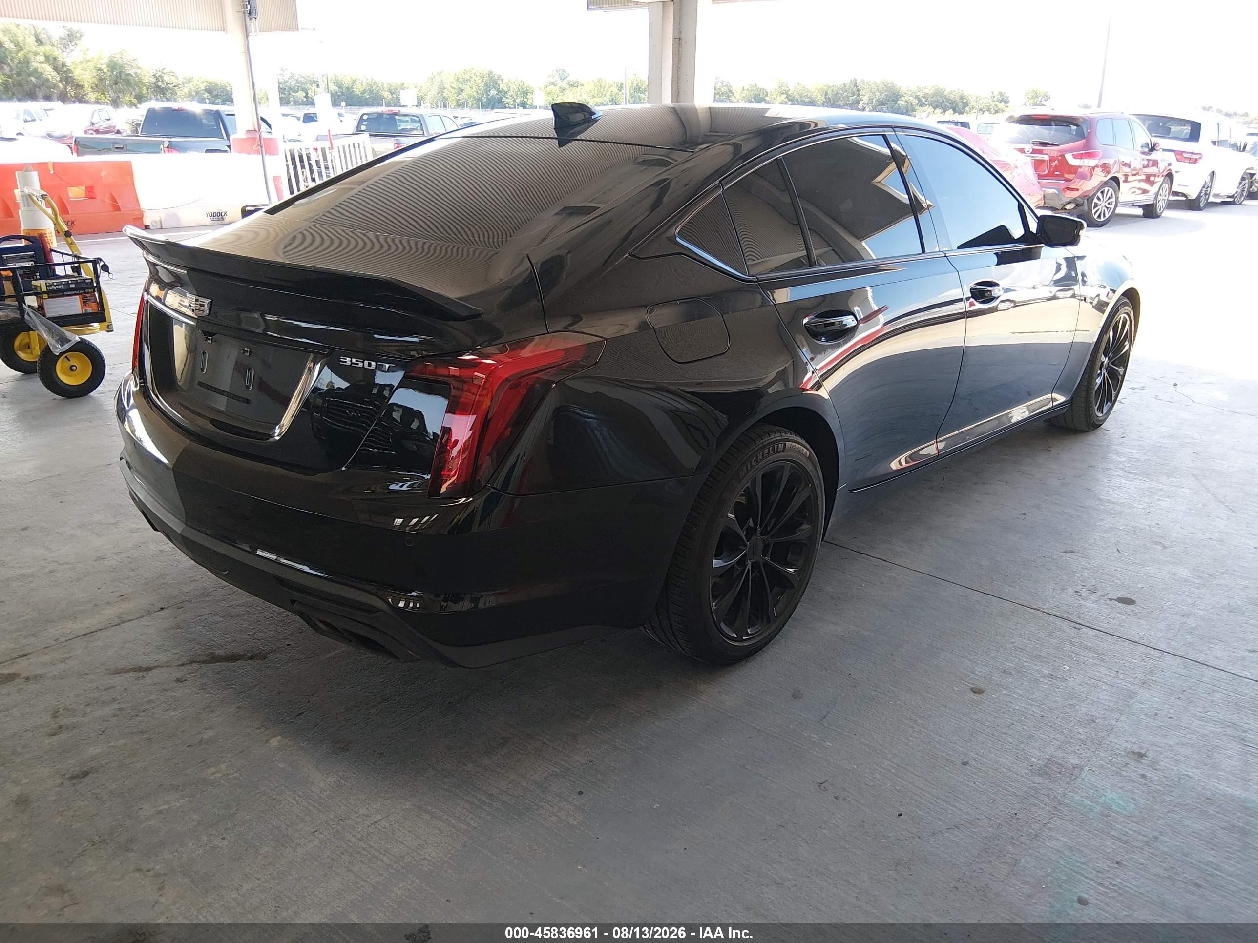 2020 Cadillac CT5 VIN 1G6DN5RK3L0136540 IAAI salvage auction — Side, Rebuildable (Florida), sold $8,300 on 2026-09-12 (photo 4)