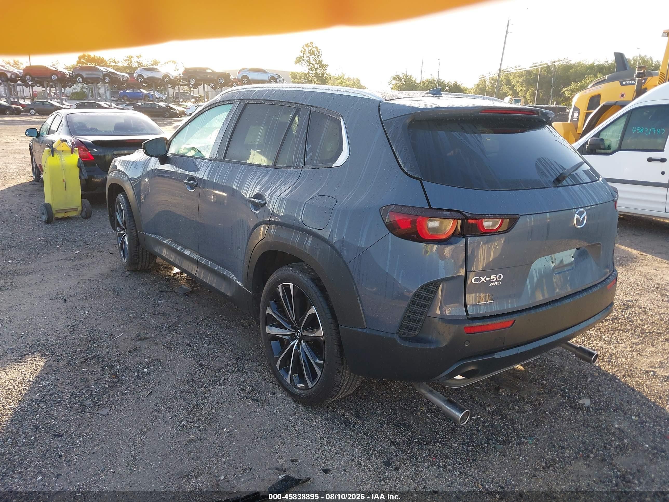 2026 Mazda CX-50 VIN 7MMVABDL7TN483934 IAAI salvage auction — Side, Rebuildable (Florida), sold $8,300 on 2026-09-11 (photo 3)
