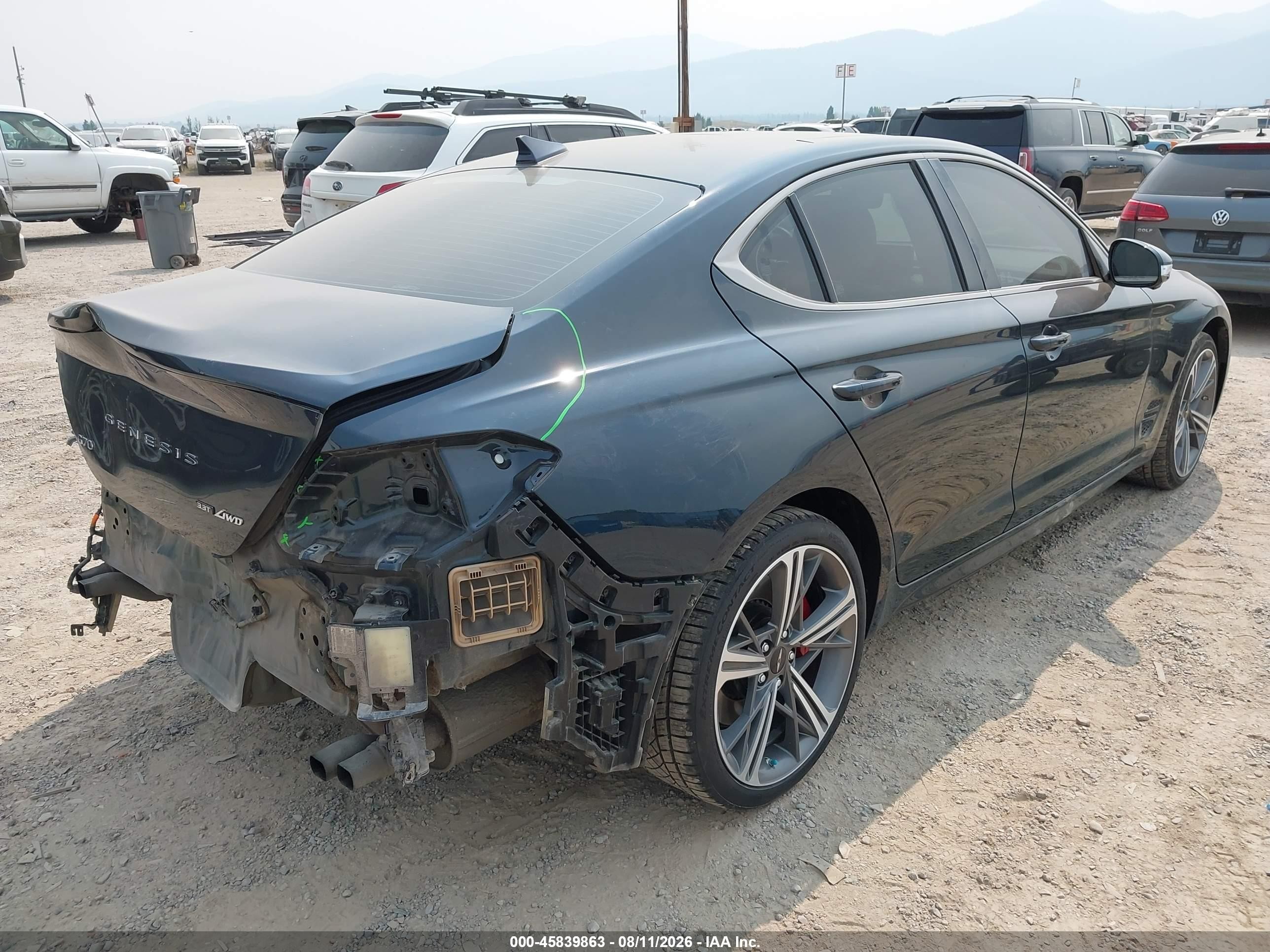 2024 Genesis G70 VIN KMTG54SE0RU140931 IAAI salvage auction — Rear End, Salvage (Montana), sold $13,600 on 2026-09-19 (photo 4)