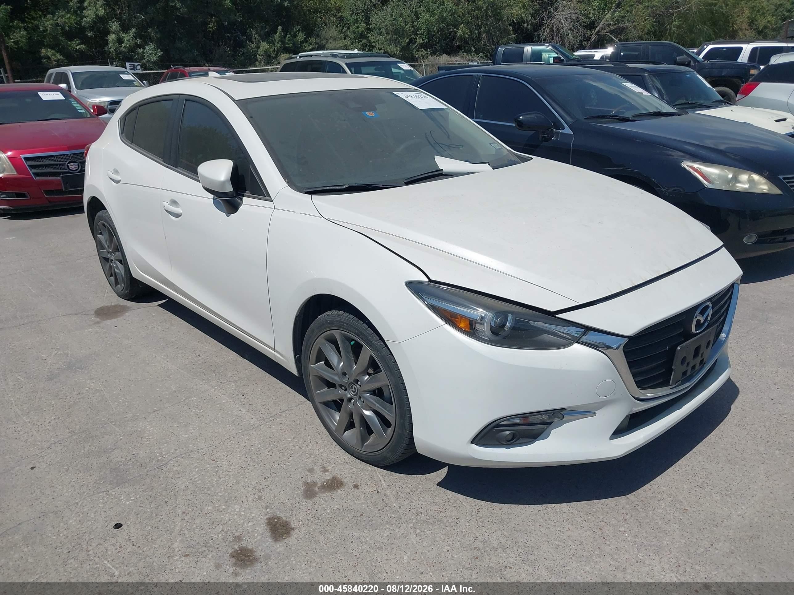 2018 Mazda 3 VIN 3MZBN1M34JM260711 — IAAI salvage auction photo