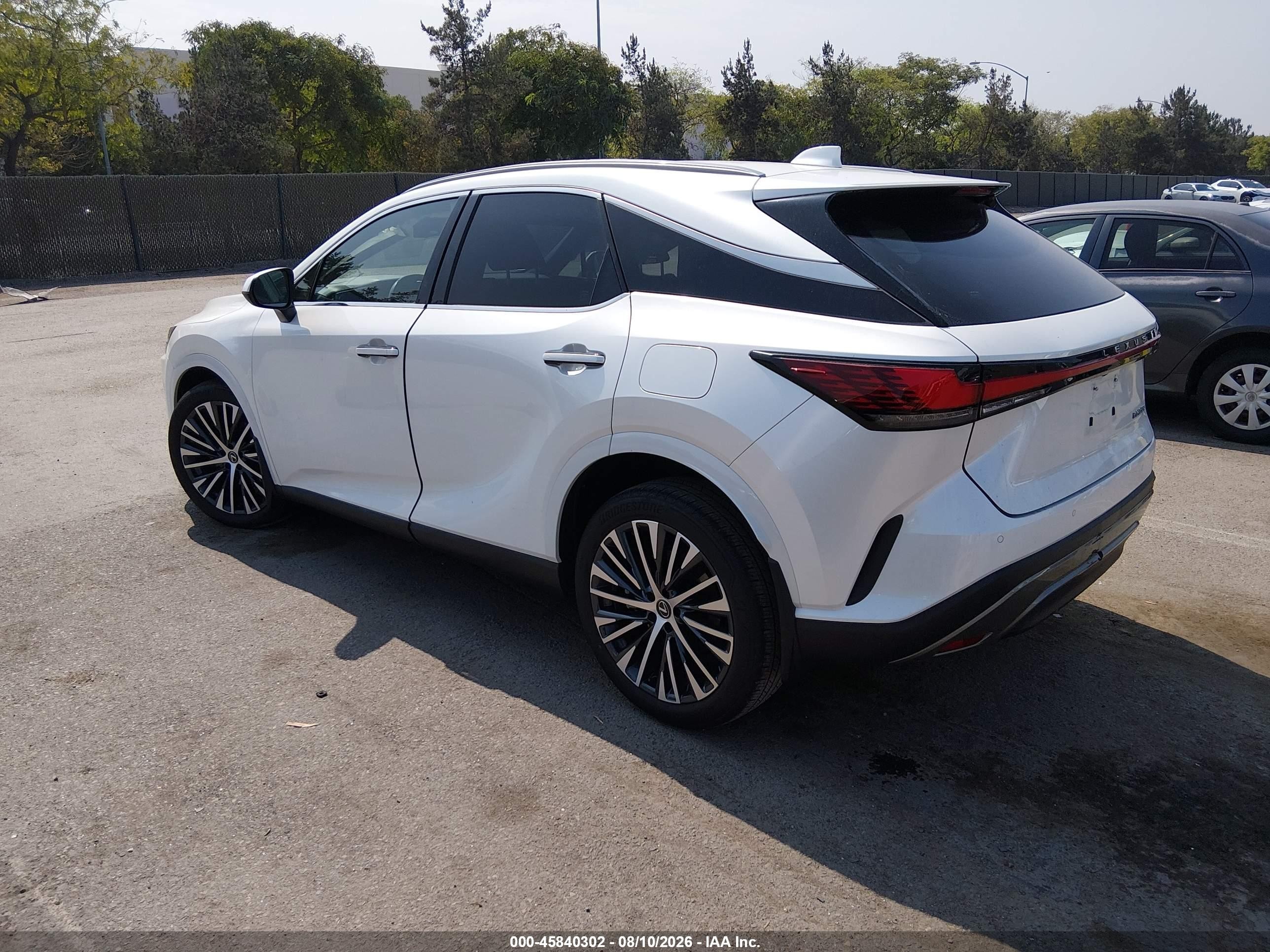 2023 Lexus Rx VIN JTJCHMAA8P2004586 IAAI salvage auction — Unknown, Salvage (California), sold $20,100 on 2026-08-24 (photo 3)