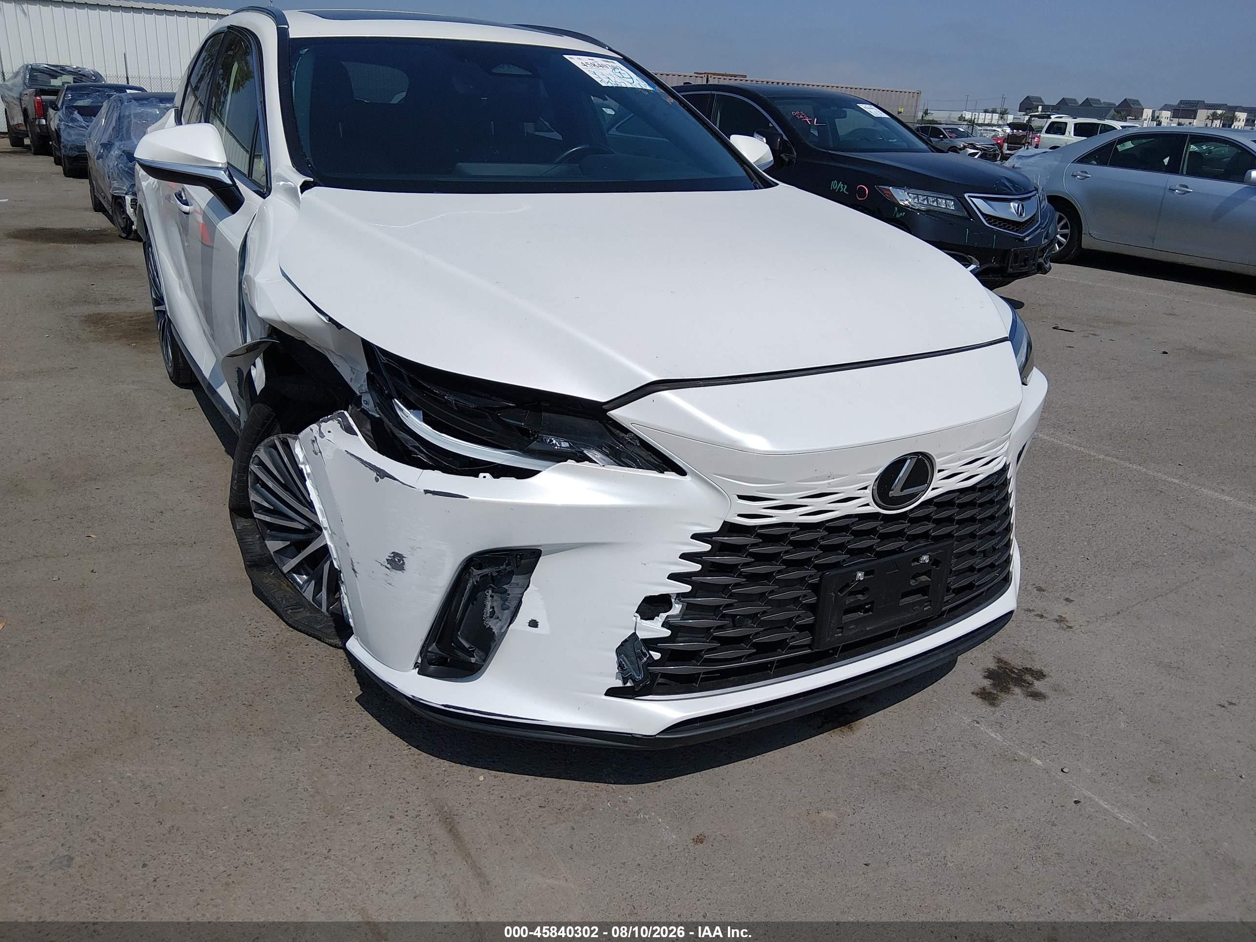 2023 Lexus Rx VIN JTJCHMAA8P2004586 IAAI salvage auction — Unknown, Salvage (California), sold $20,100 on 2026-08-24 (photo 6)