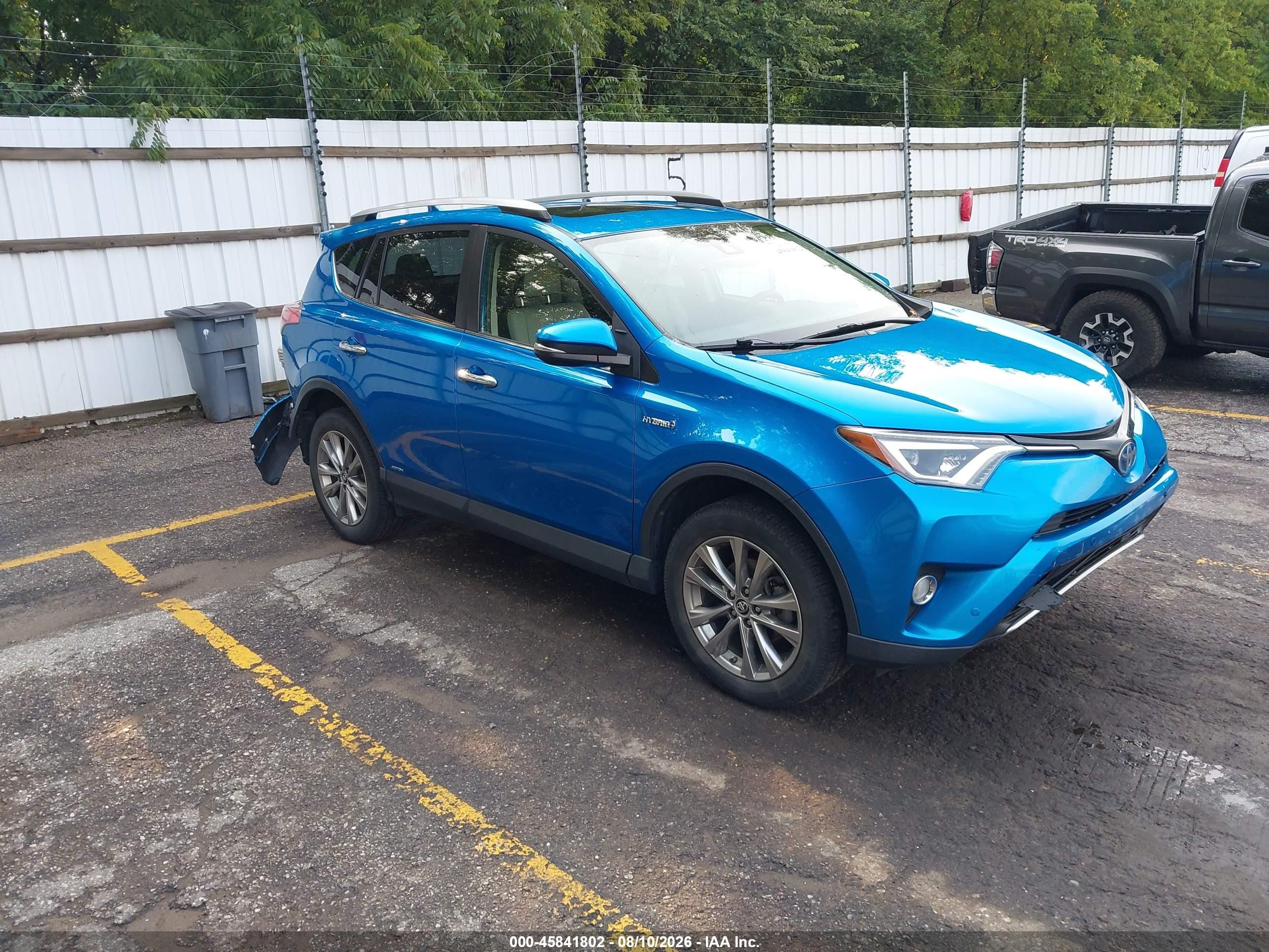 2016 Toyota RAV4 Hybrid VIN JTMDJREV4GD027065 — IAAI salvage auction photo