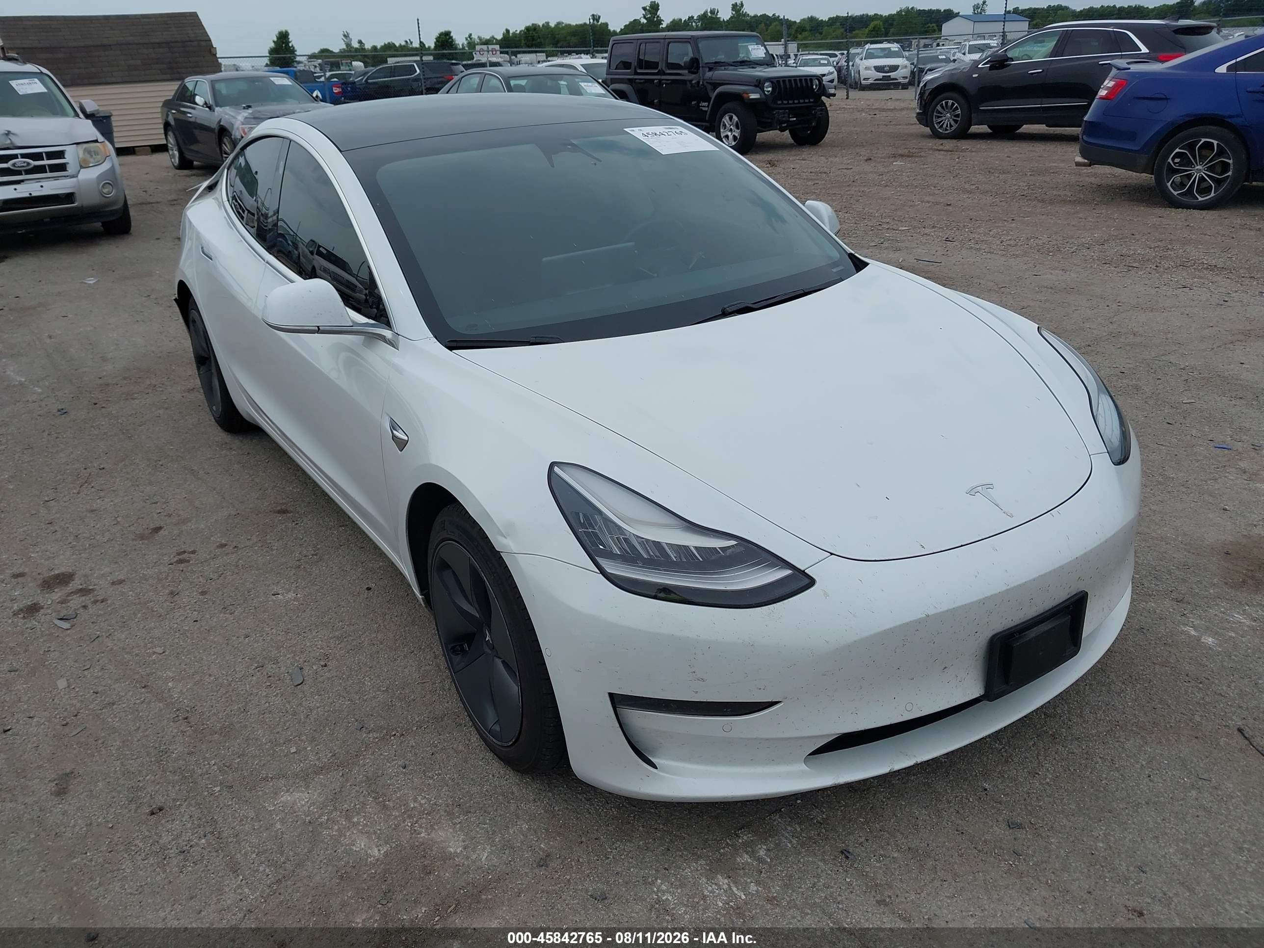 2020 Tesla Model 3 VIN 5YJ3E1EB0LF637152 IAAI salvage auction — Rear End, Salvage (Illinois), sold $8,200 on 2026-09-11 (photo 1)