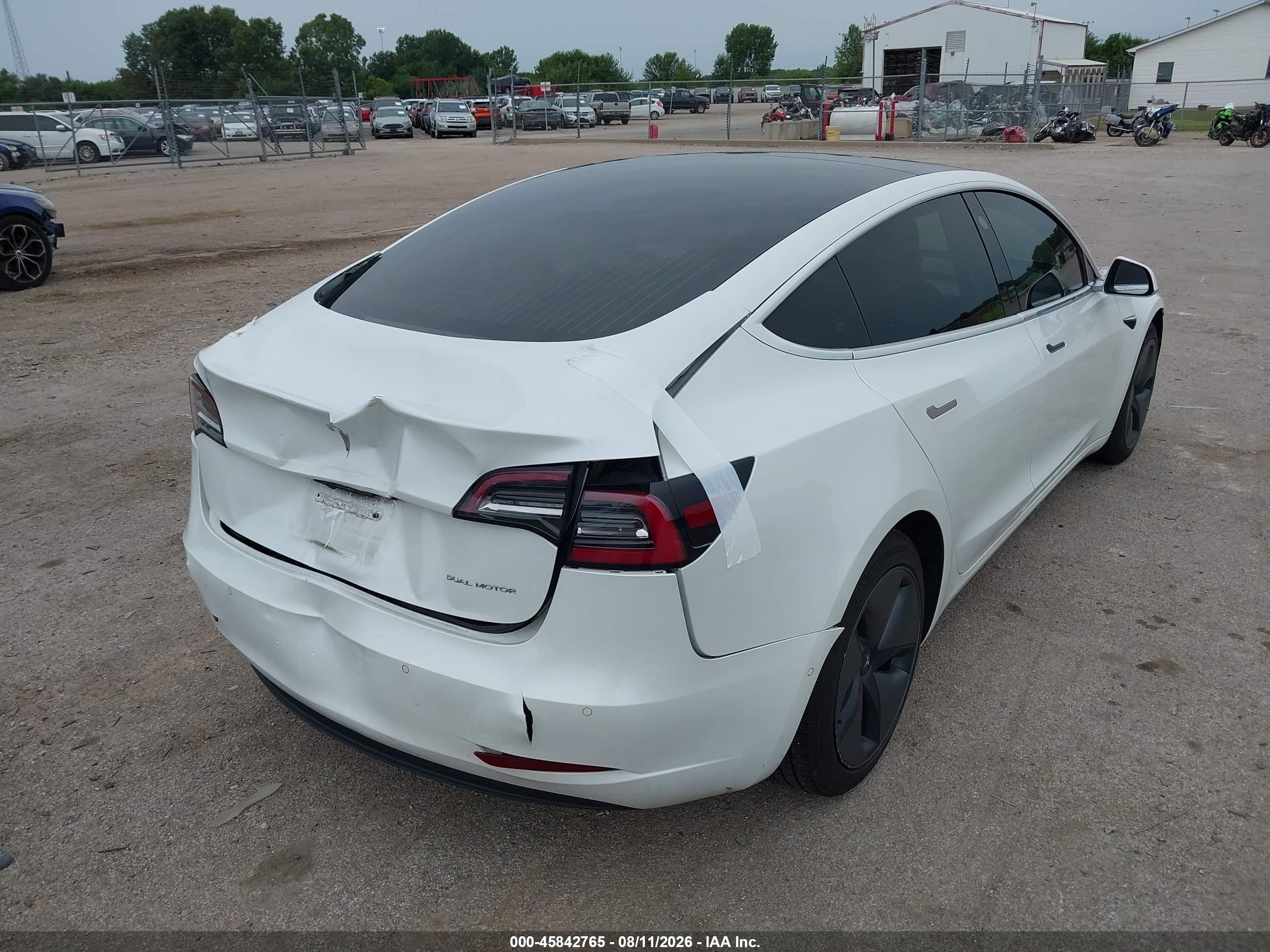 2020 Tesla Model 3 VIN 5YJ3E1EB0LF637152 IAAI salvage auction — Rear End, Salvage (Illinois), sold $8,200 on 2026-09-11 (photo 4)