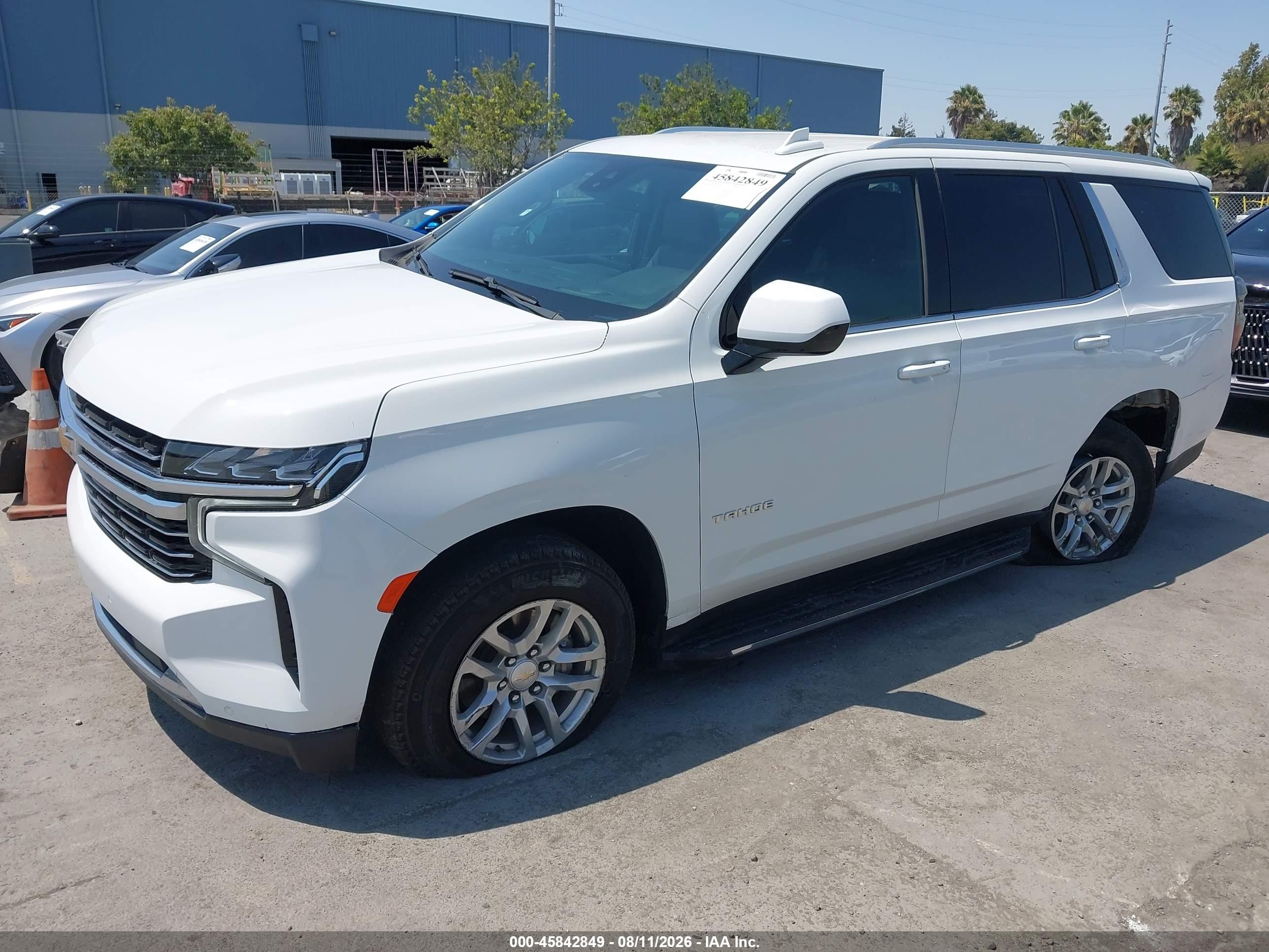 2023 Chevrolet Tahoe VIN 1GNSCNKD6PR372890 IAAI salvage auction — Rear End, Salvage (California), sold $19,900 on 2026-10-04 (photo 2)