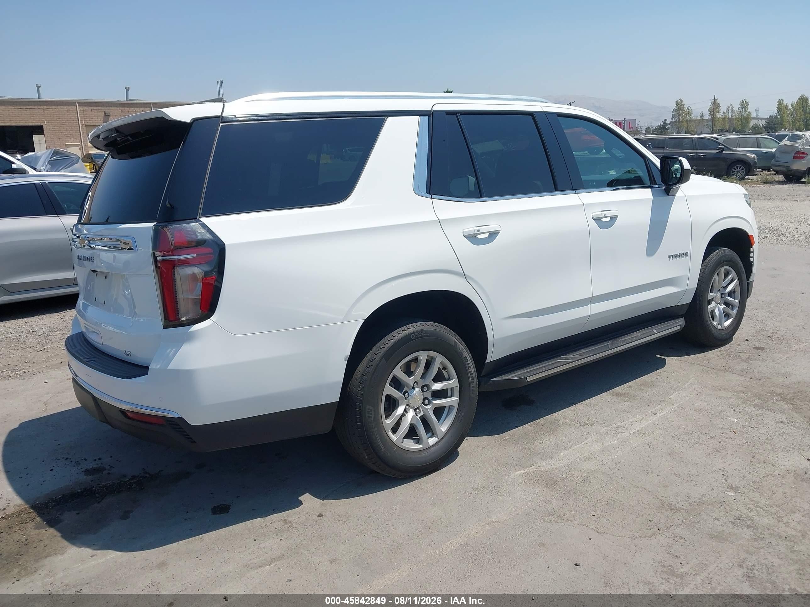 2023 Chevrolet Tahoe VIN 1GNSCNKD6PR372890 IAAI salvage auction — Rear End, Salvage (California), sold $19,900 on 2026-10-04 (photo 4)