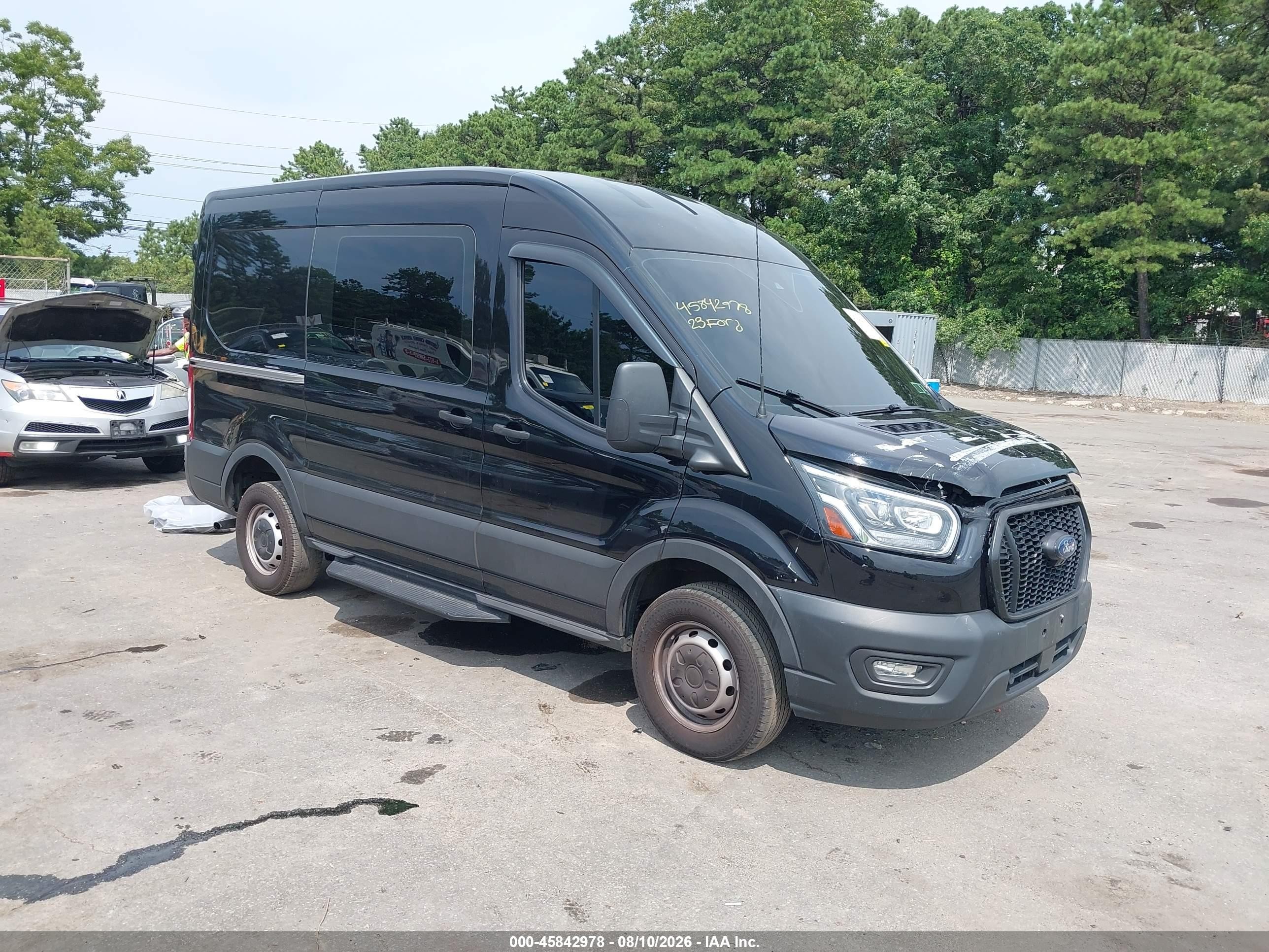 2023 Ford Transit-250 VIN 1FTBR1D8XPKA67997 — IAAI salvage auction photo