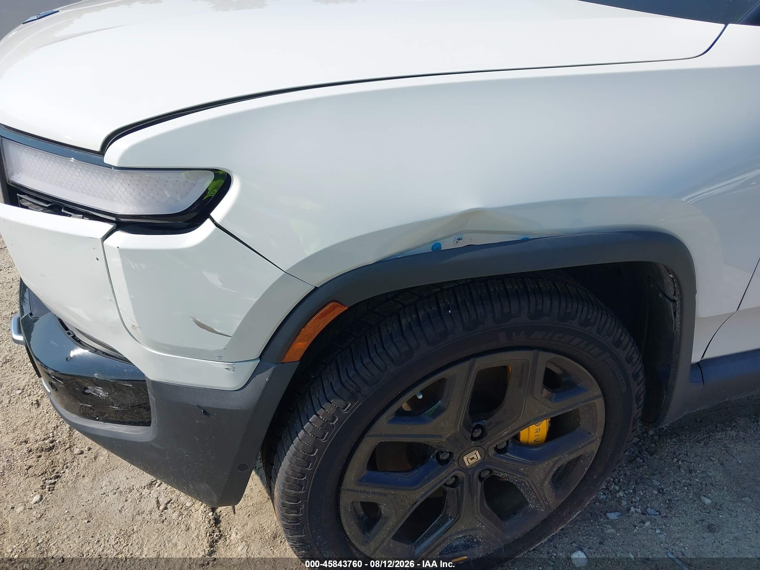 2023 Rivian R1s VIN 7PDSGABA9PN010385 IAAI salvage auction — Side, Salvage (North Carolina), sold $18,000 on 2026-09-29 (photo 6)