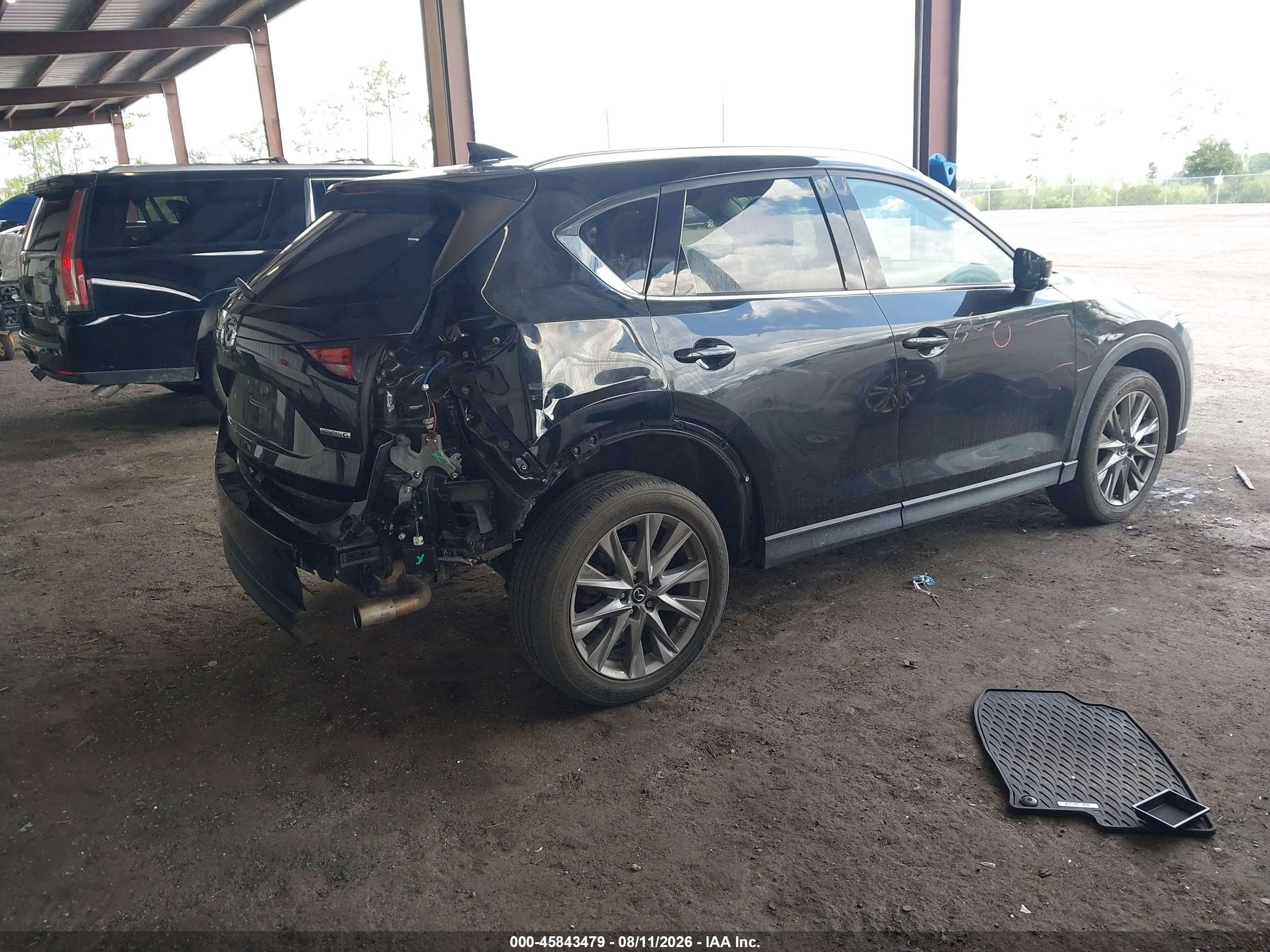 2020 Mazda CX-5 VIN JM3KFADM5L0828308 IAAI salvage auction — Rear End, Rebuildable (Florida), sold $5,000 on 2026-09-11 (photo 4)