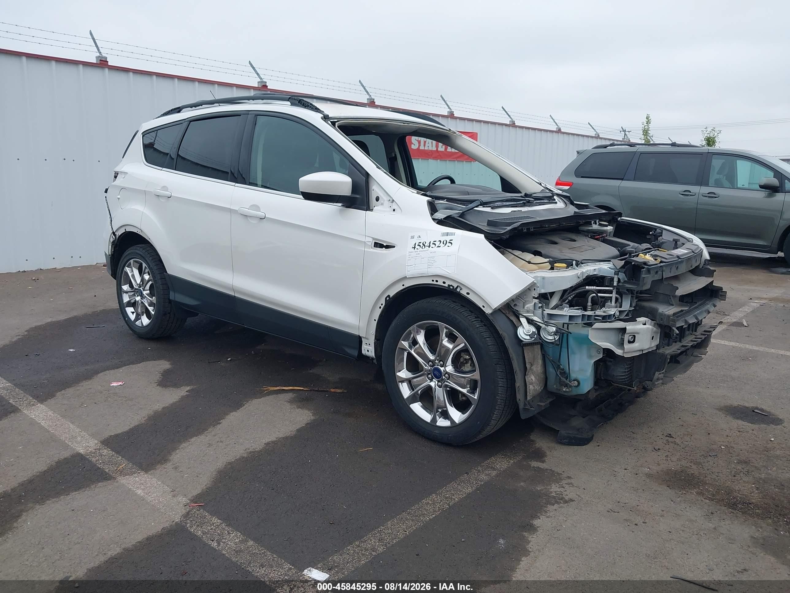 2015 Ford Escape VIN 1FMCU9G90FUC13179 IAAI salvage auction — Front & Rear, Salvage (Oregon), sold $725 on 2026-09-24 (photo 1)