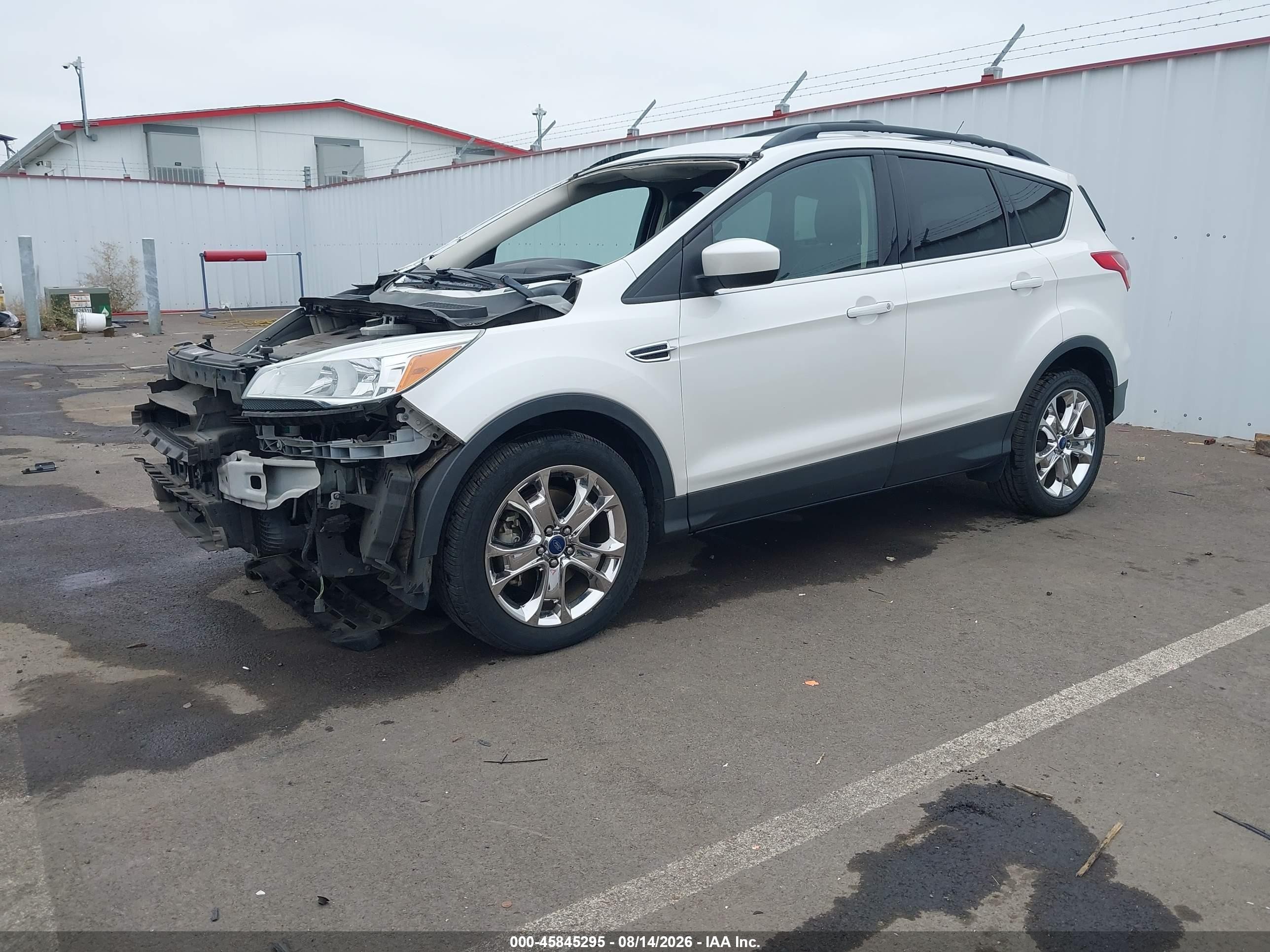 2015 Ford Escape VIN 1FMCU9G90FUC13179 IAAI salvage auction — Front & Rear, Salvage (Oregon), sold $725 on 2026-09-24 (photo 2)