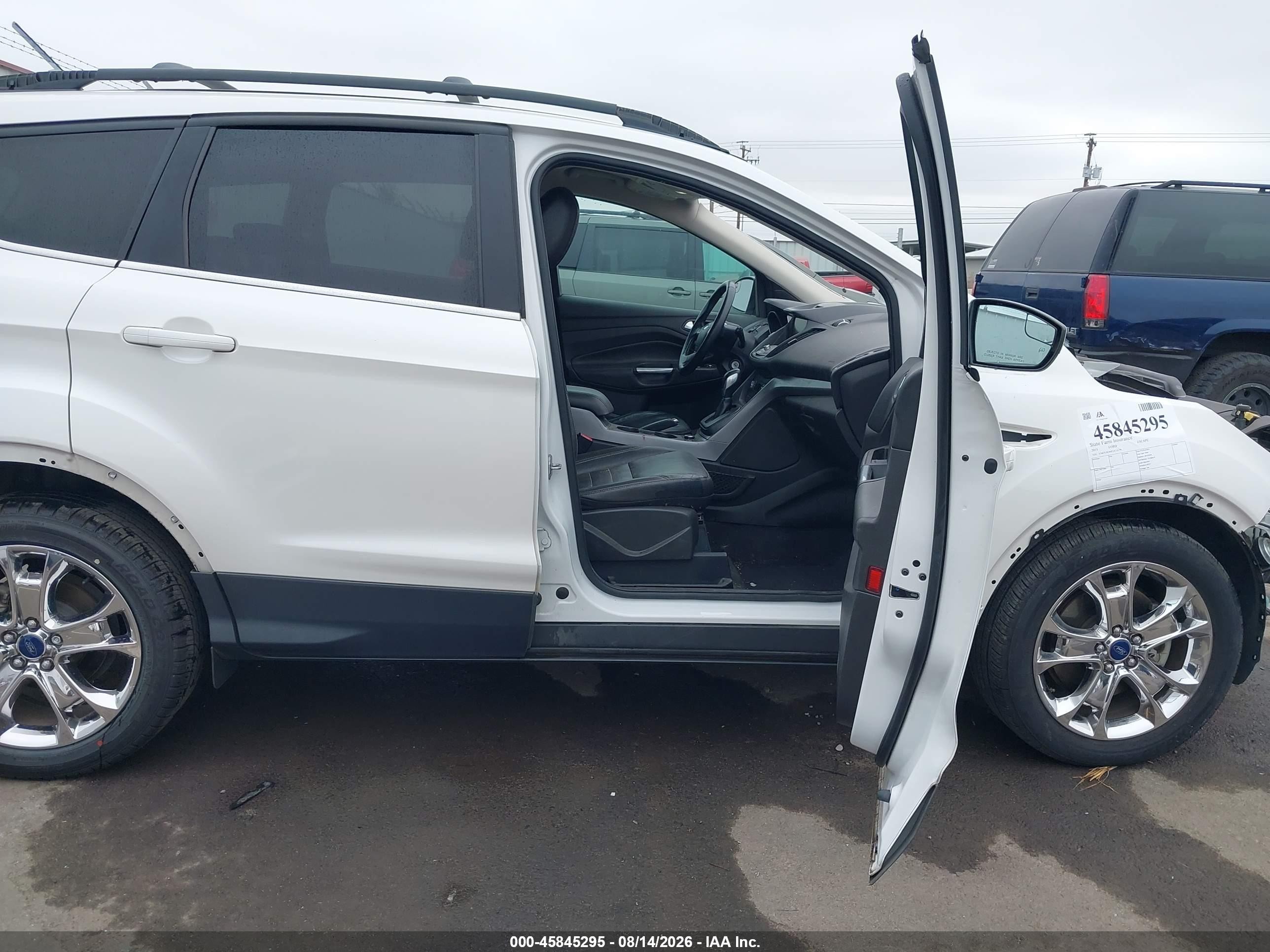 2015 Ford Escape VIN 1FMCU9G90FUC13179 IAAI salvage auction — Front & Rear, Salvage (Oregon), sold $725 on 2026-09-24 (photo 5)