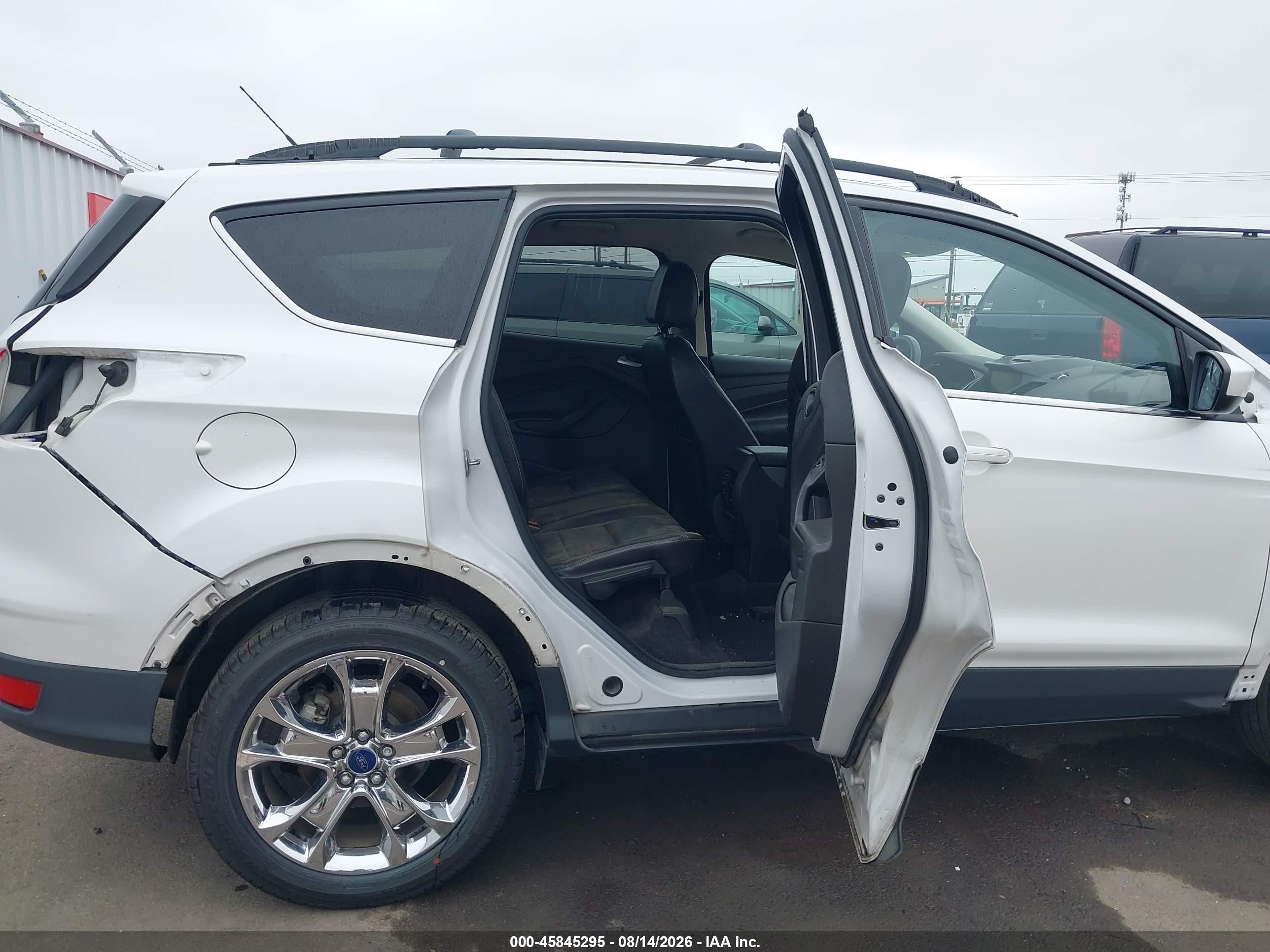 2015 Ford Escape VIN 1FMCU9G90FUC13179 IAAI salvage auction — Front & Rear, Salvage (Oregon), sold $725 on 2026-09-24 (photo 8)