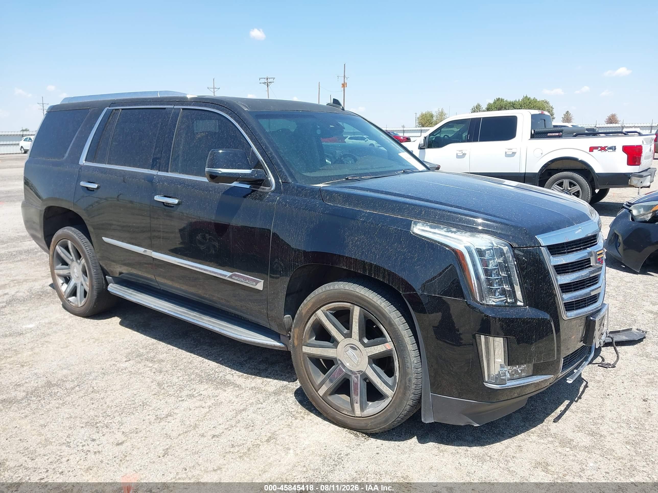 2015 Cadillac Escalade VIN 1GYS4MKJ2FR710395 — IAAI salvage auction photo