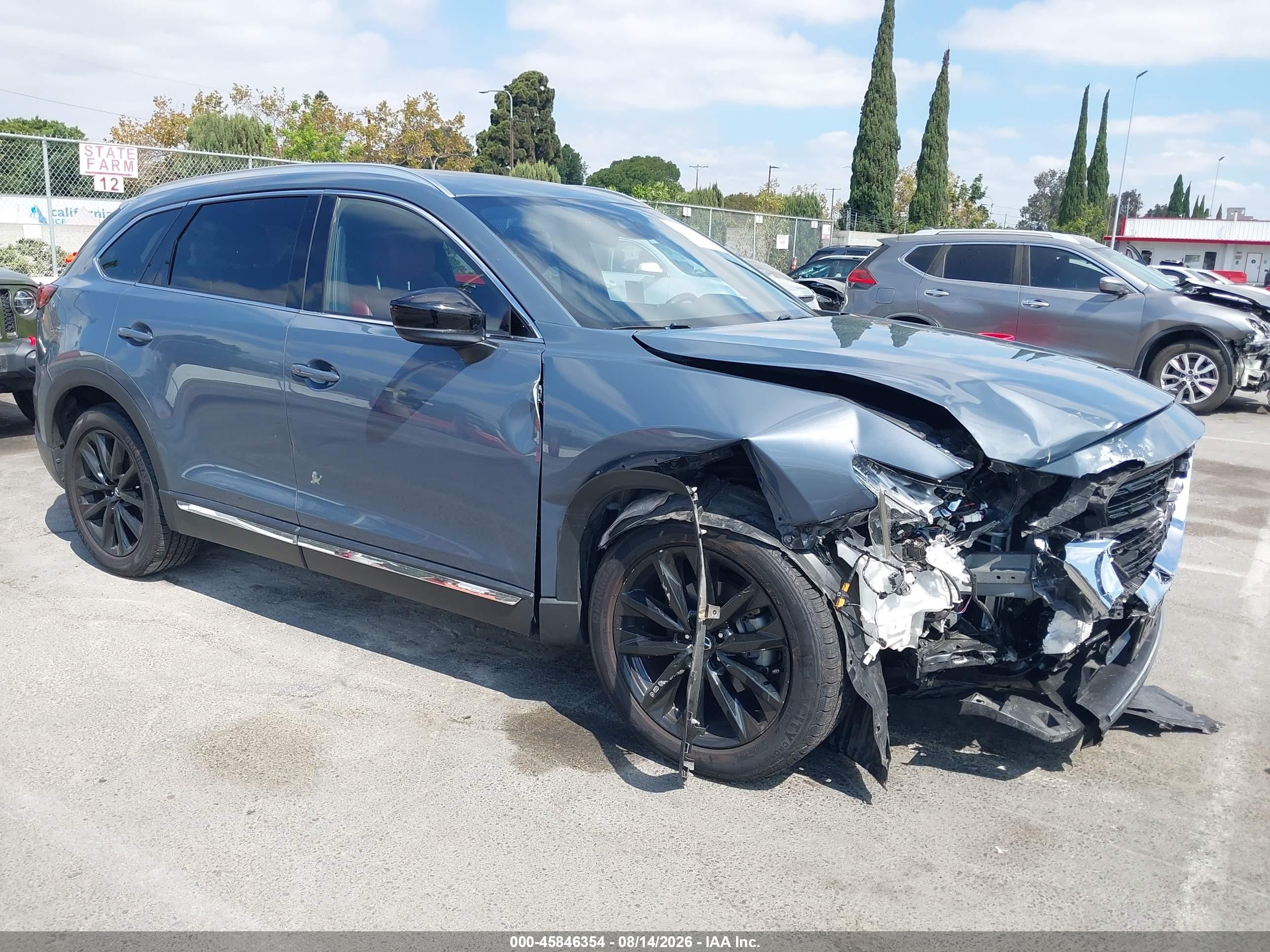 2023 Mazda CX-9 VIN JM3TCBDY3P0634128 — IAAI salvage auction photo