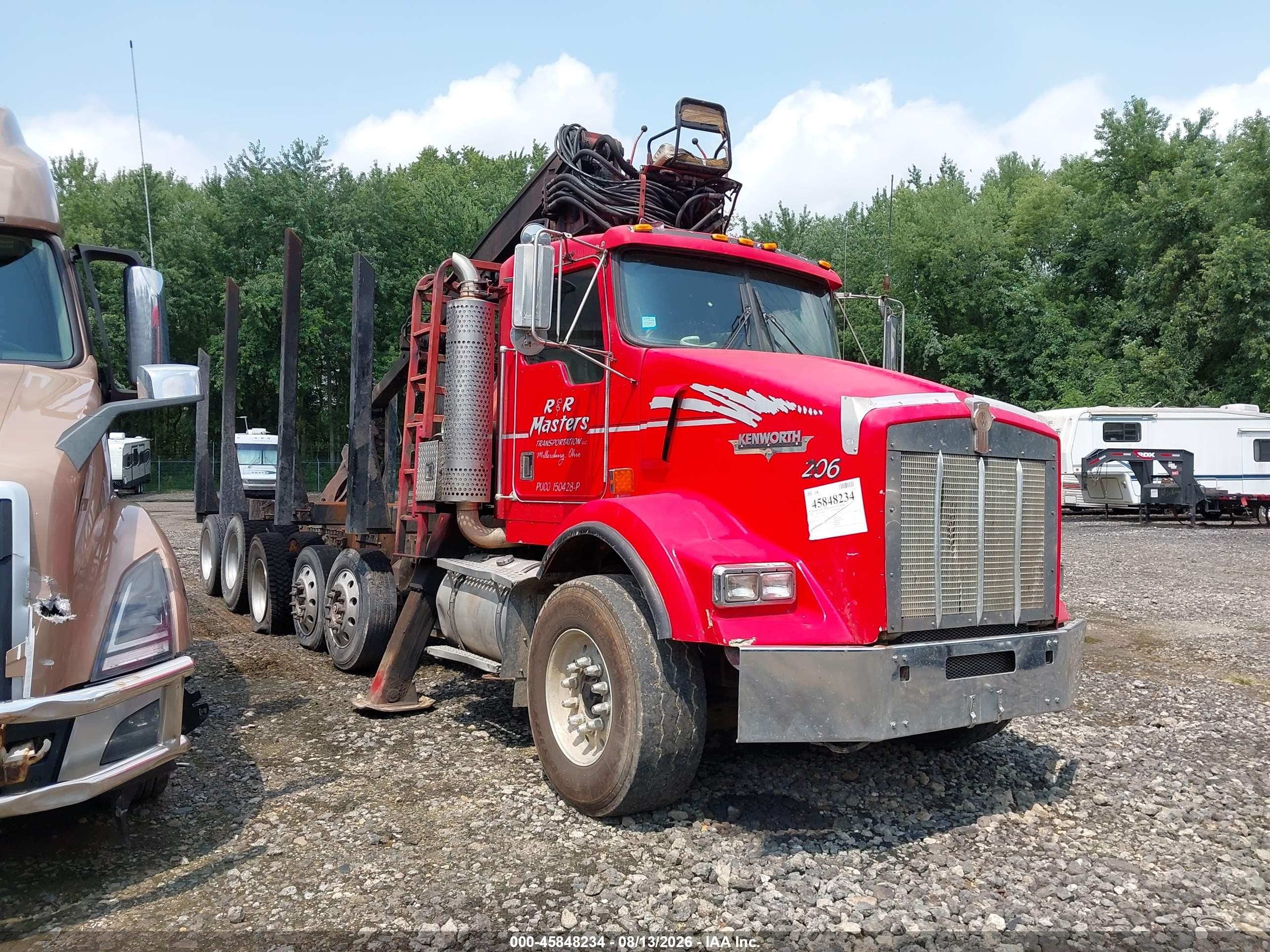 2000 Kenworth Construction VIN 1NKDXUTX1YS857231 — IAAI salvage auction photo
