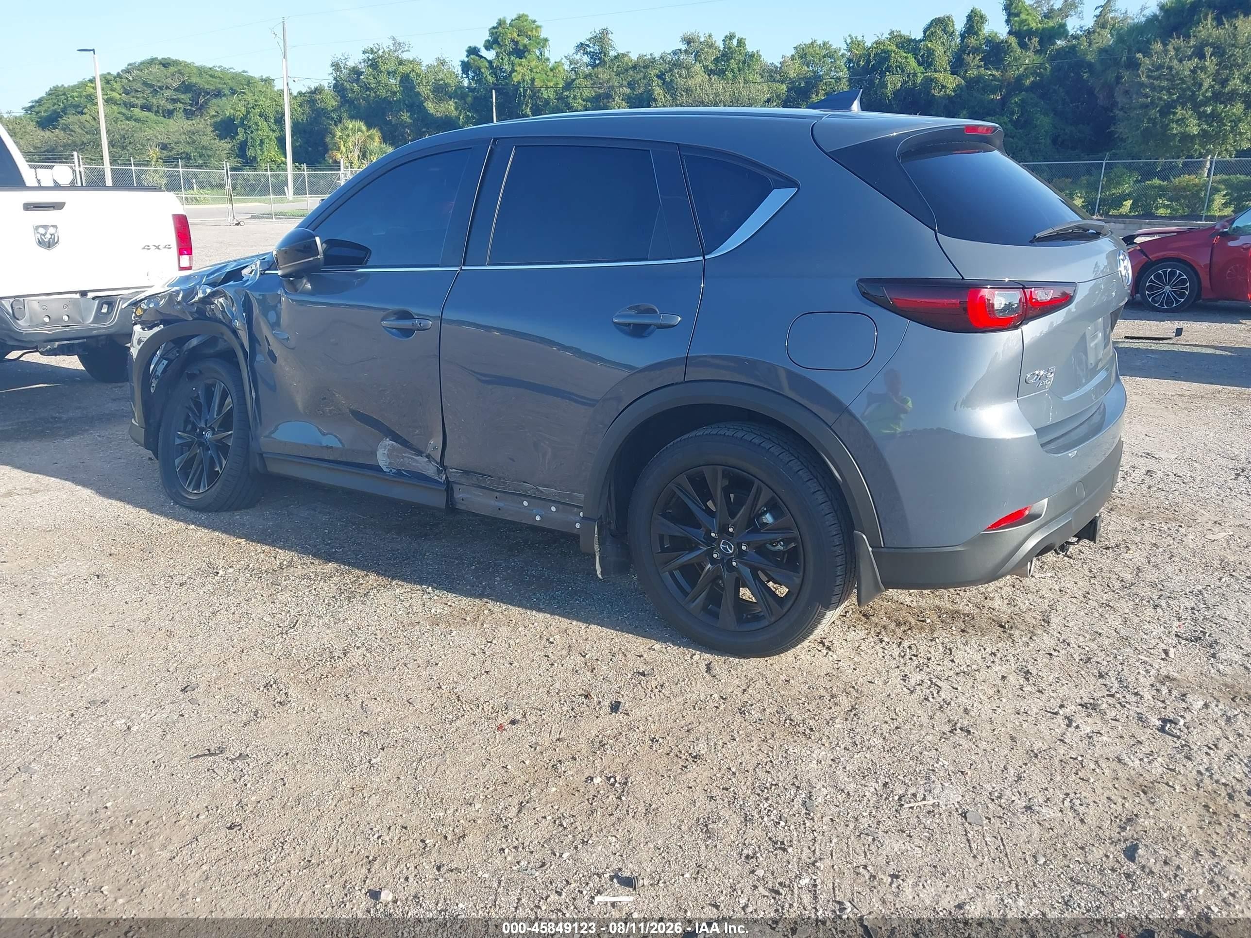 2023 Mazda Cx-5 VIN JM3KFBCM2P0215625 IAAI salvage auction — Side, Certificate Of Destruction (Florida), sold $7,850 on 2026-09-03 (photo 3)