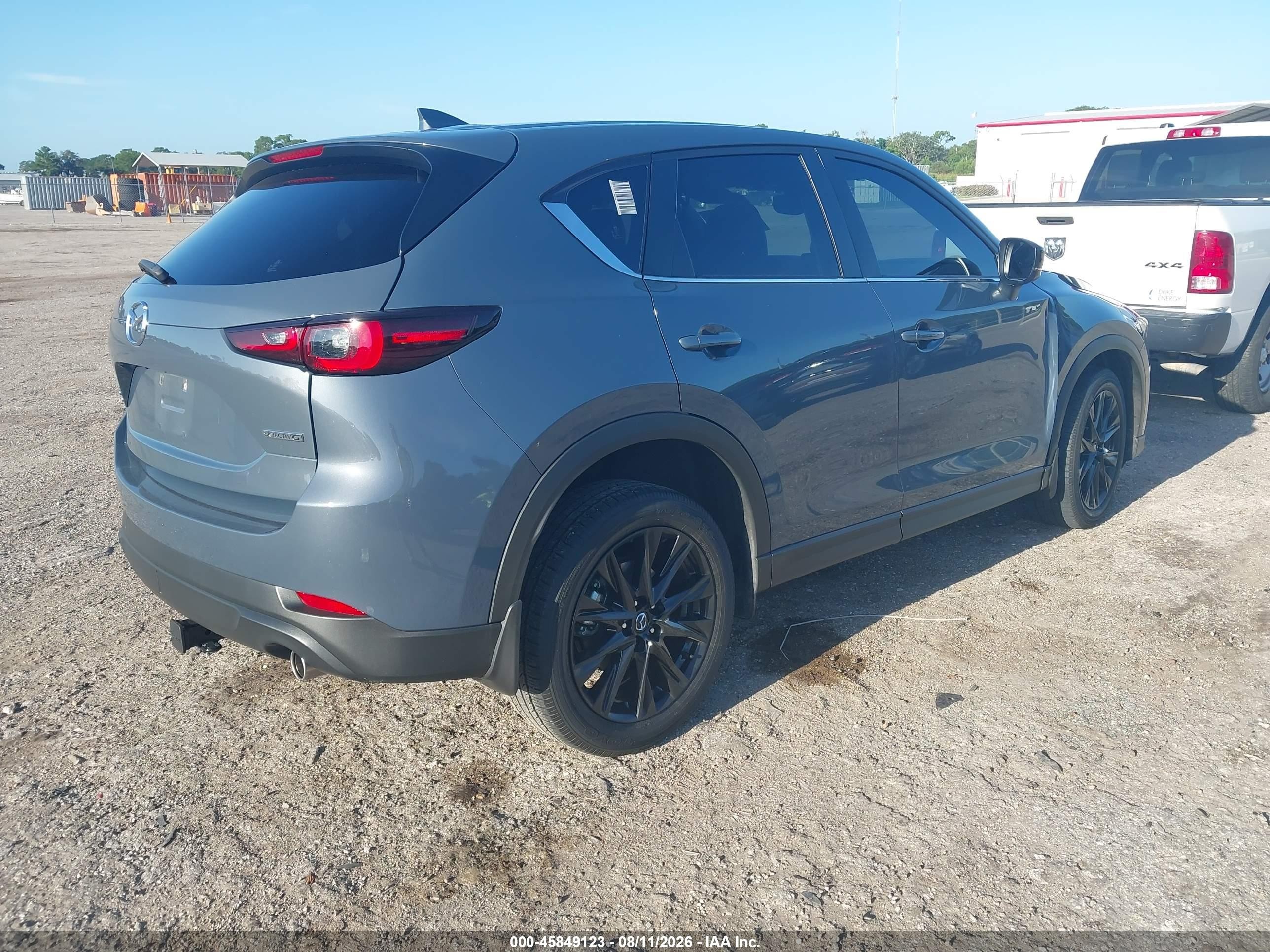 2023 Mazda Cx-5 VIN JM3KFBCM2P0215625 IAAI salvage auction — Side, Certificate Of Destruction (Florida), sold $7,850 on 2026-09-03 (photo 4)