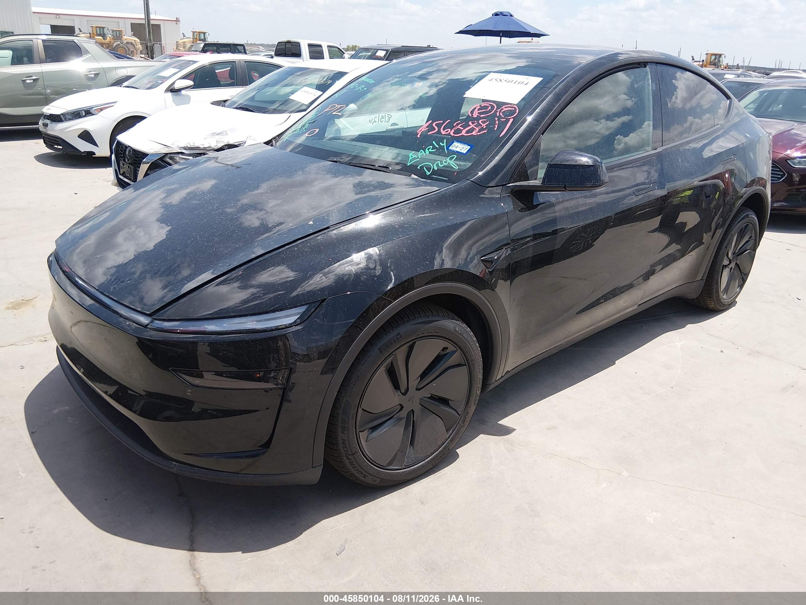 2026 Tesla Model y VIN 7SAYGDED0TA674821 IAAI salvage auction — Unknown, Original (Texas), sold $19,800 on 2026-10-05 (photo 2)