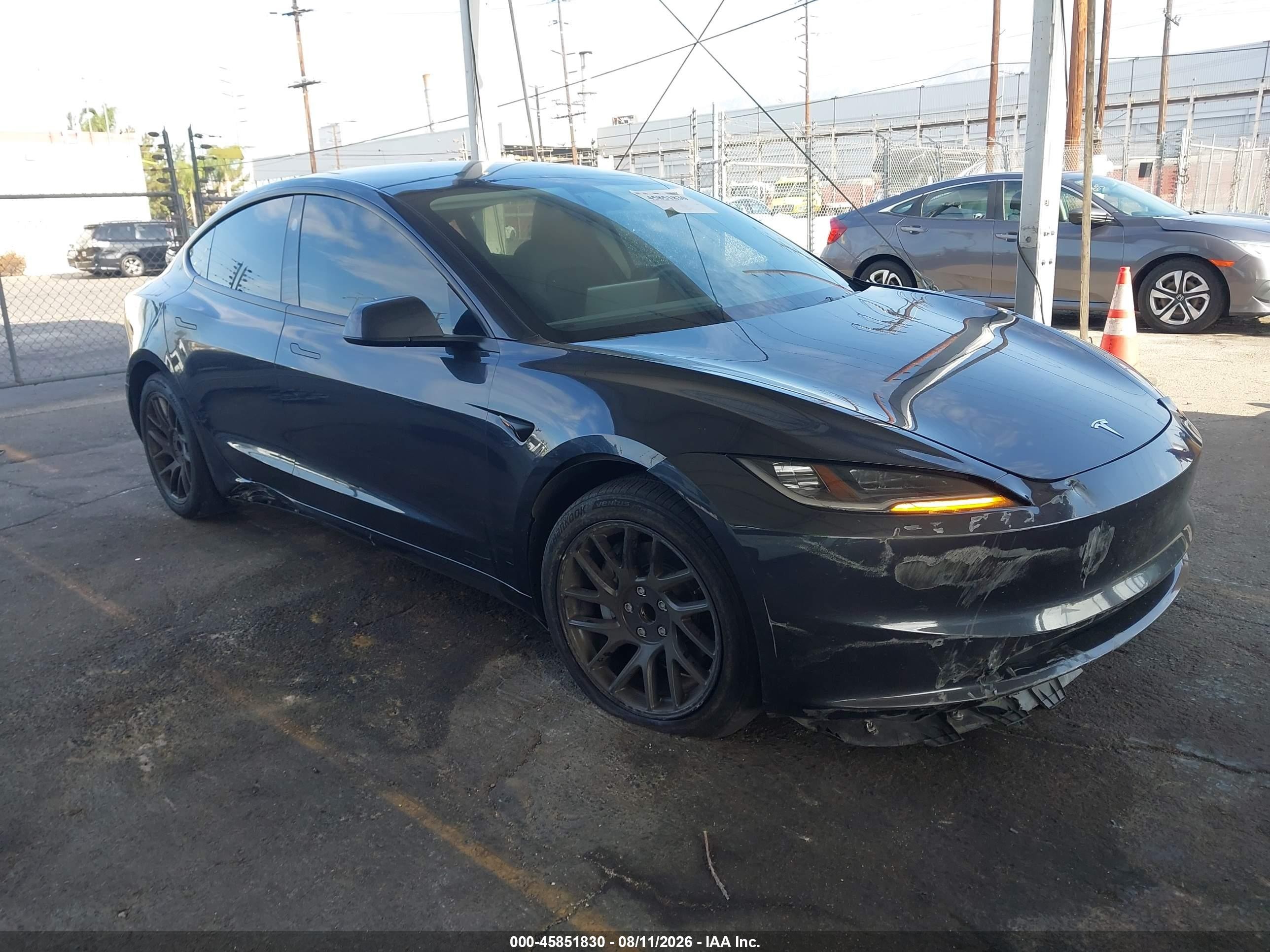 2025 Tesla Model 3 VIN 5YJ3E1EA1SF050464 — IAAI salvage auction photo